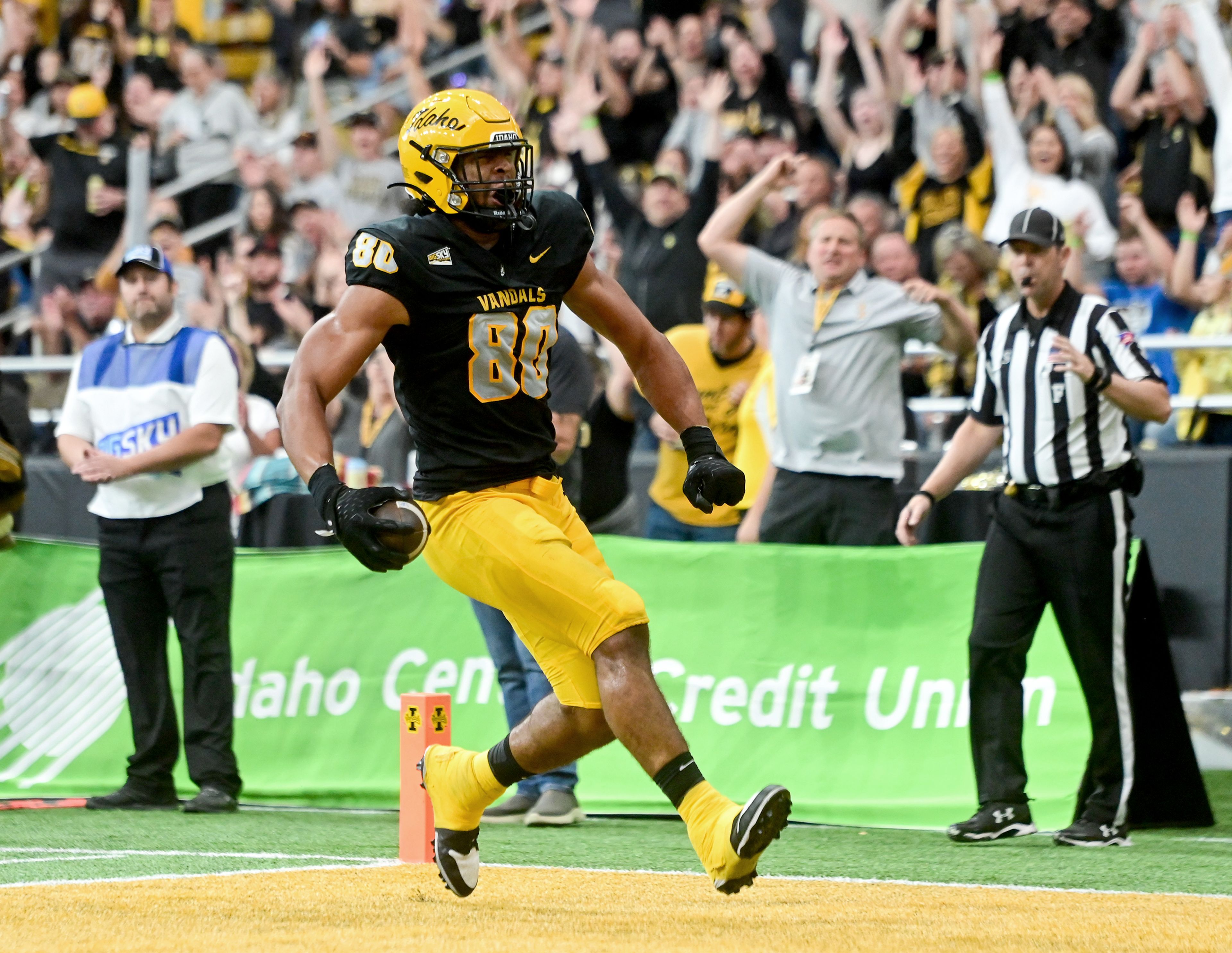 Idaho tight end Mike Martinez celebrates a touchdown as he runs into the end zone during a game against Northern Arizona Saturday at the P1FCU Kibbie Dome in Moscow.,