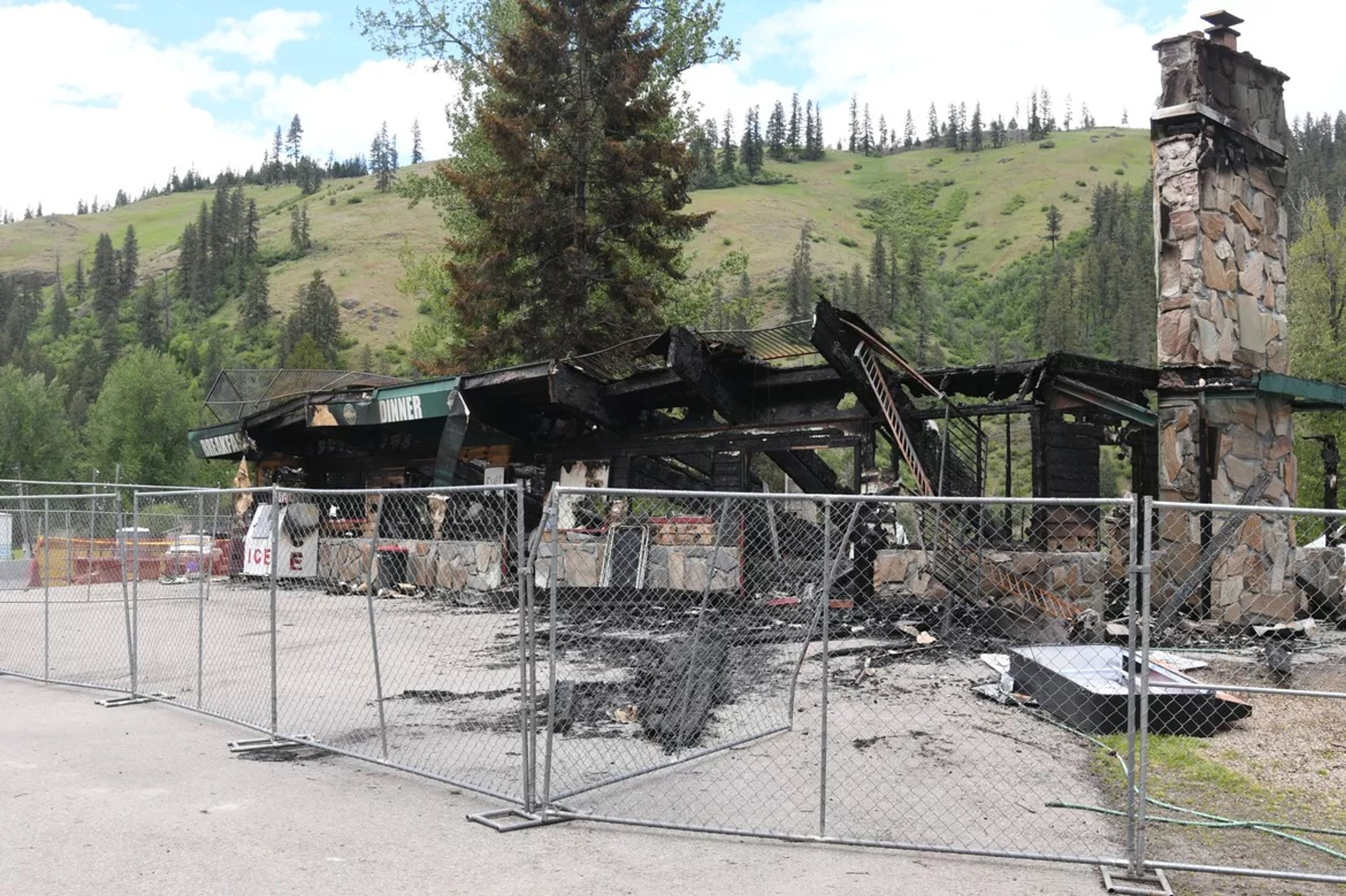 The remains of The Big Eddy Bar & Grill near Calder, Idaho, are pictured Monday. A fire destroyed the building early Friday.