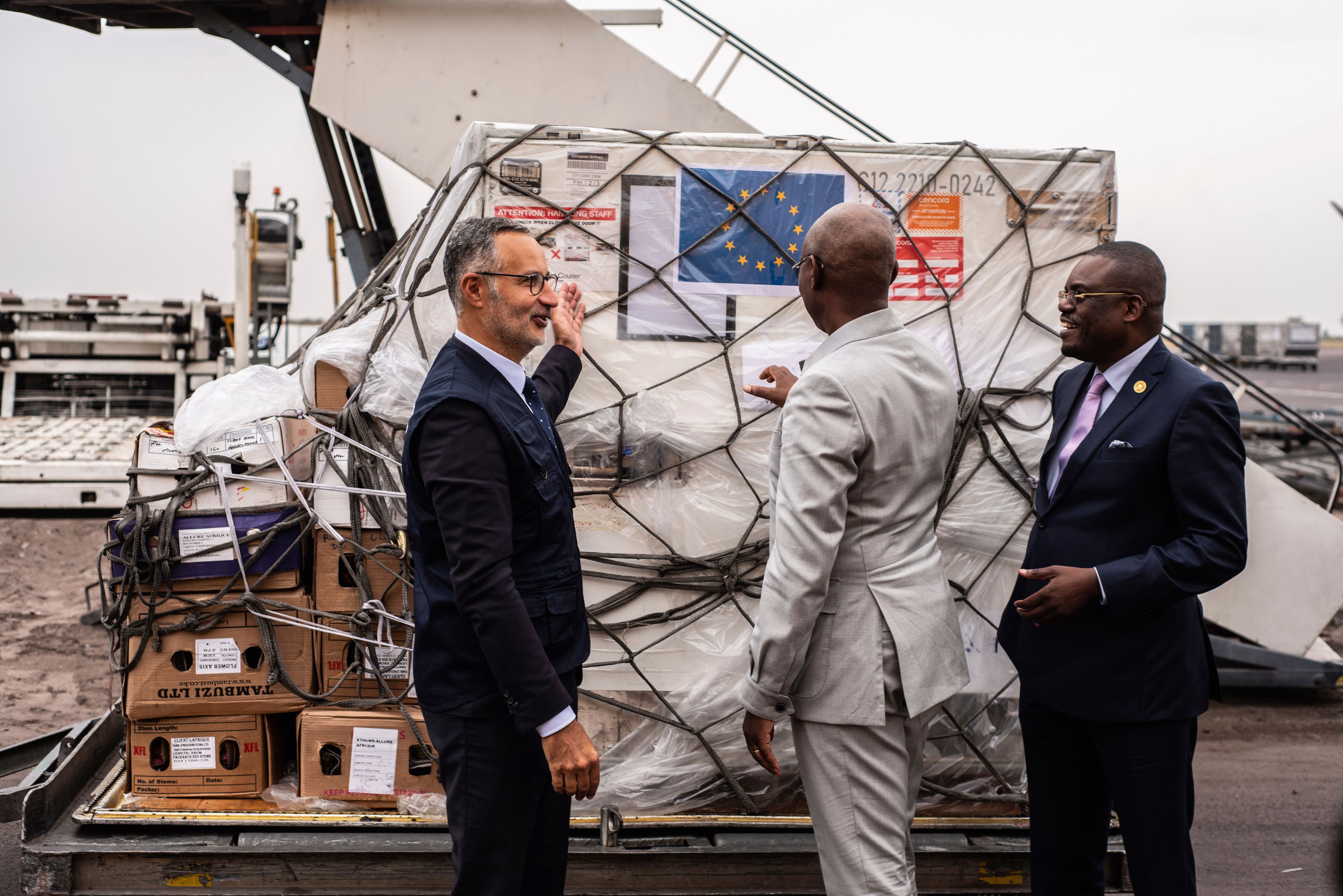 FILE - Officials check Mpox vaccine MVA-BN vaccine, manufactured by the Danish company Bavarian Nordic, at the airport in Kinshasa, Congo, Sept. 5, 2024.