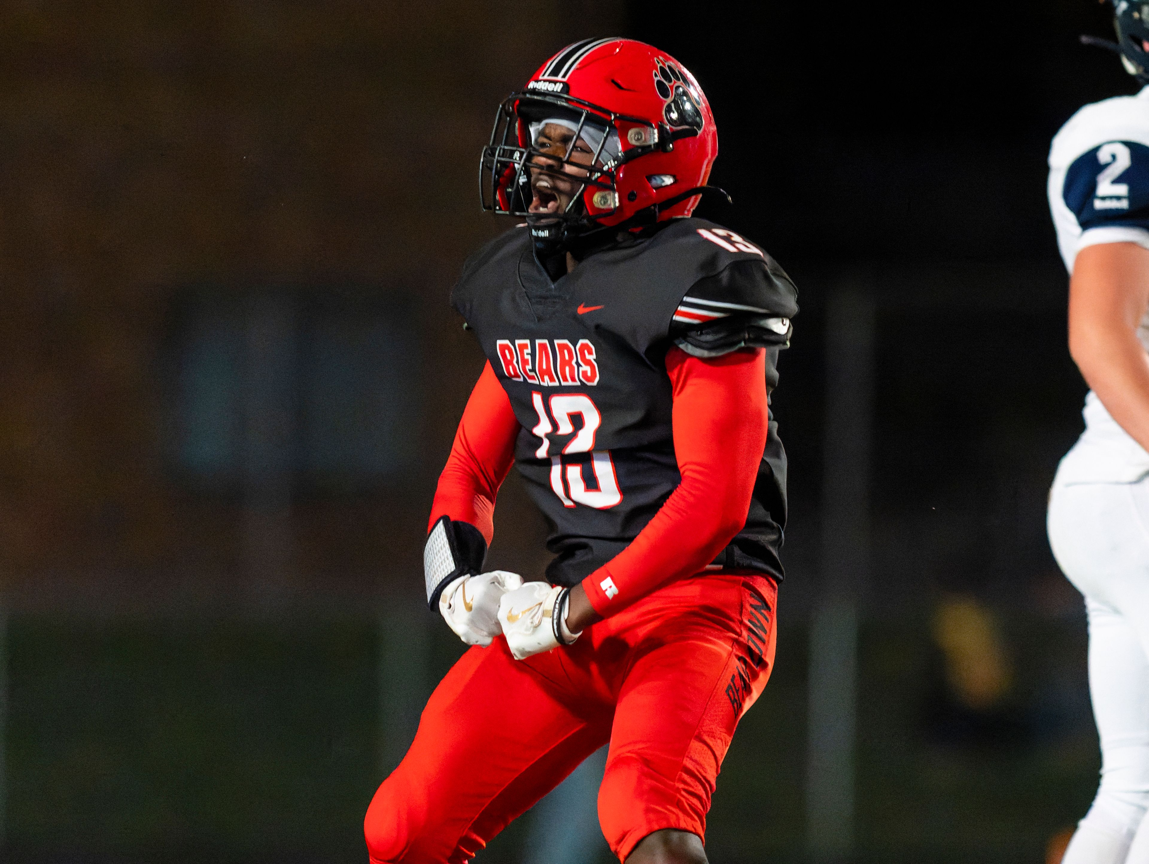 Moscow defensive back Wogayu Qualls celebrates after making a play during a game against the Bonners Ferry Badgers on Friday night at Bear Field in Moscow.