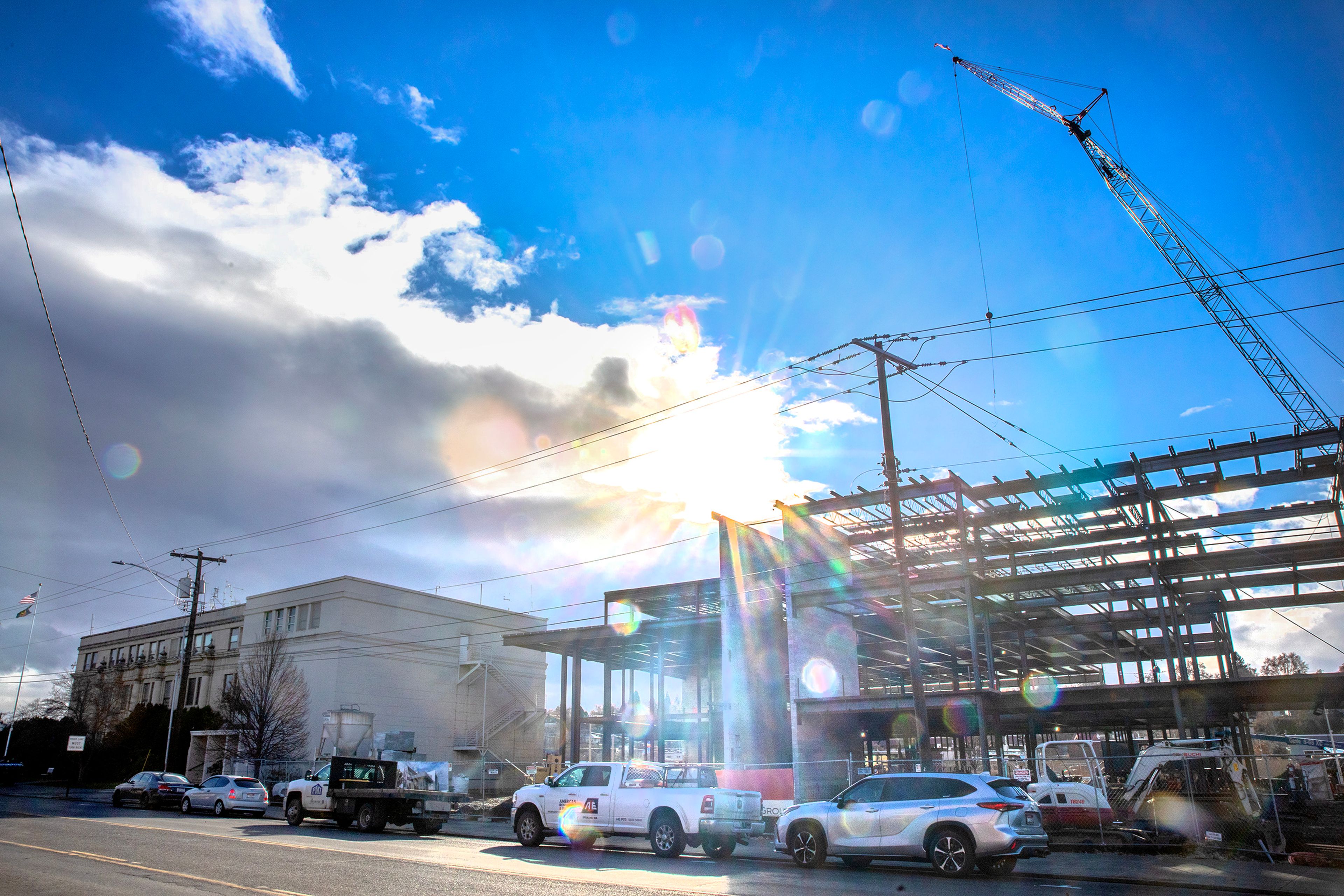 The sun shines between the clouds as construction on the new Nez Perce County Courthouse continues on Thursday in Lewiston.