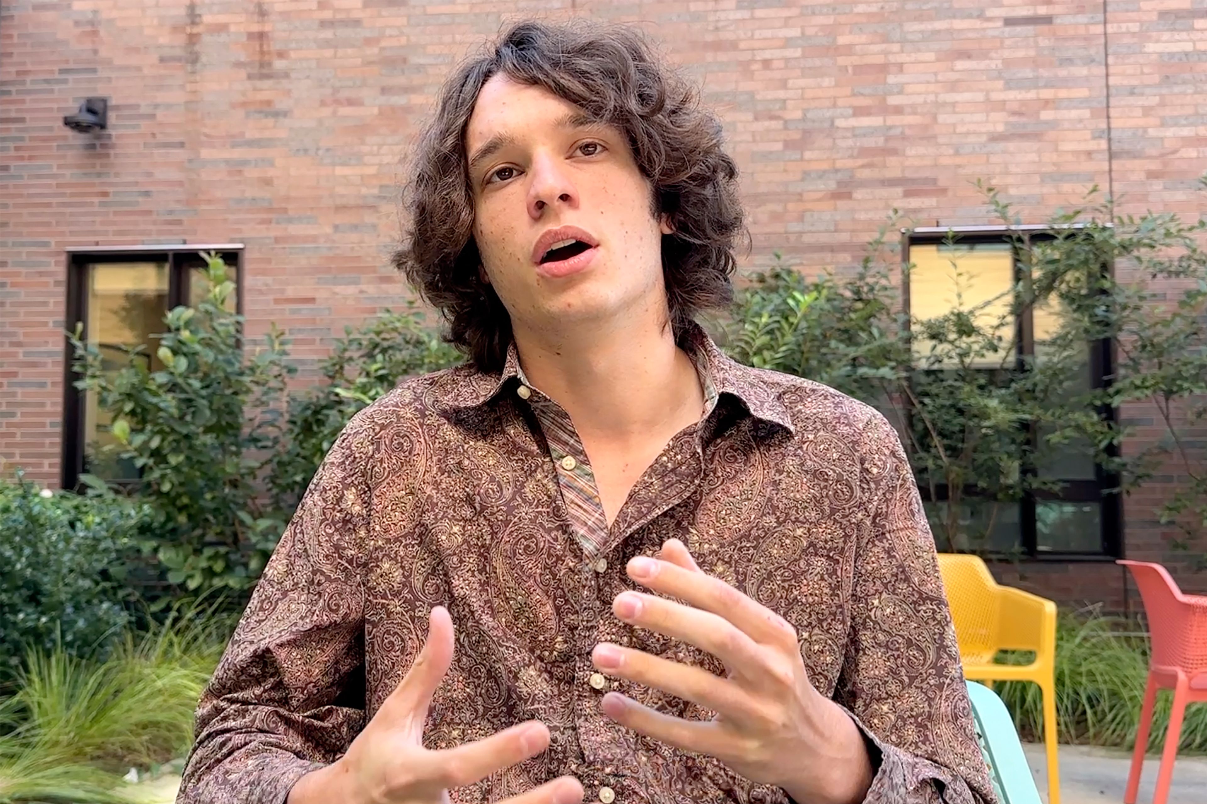 This image taken from video, Brown University student and member of the Brown Divest Coalition, Rafi Ash, speaks to a reporter from The Associated Press, Tuesday, Sept. 3, 2024, in Providence, R.I.