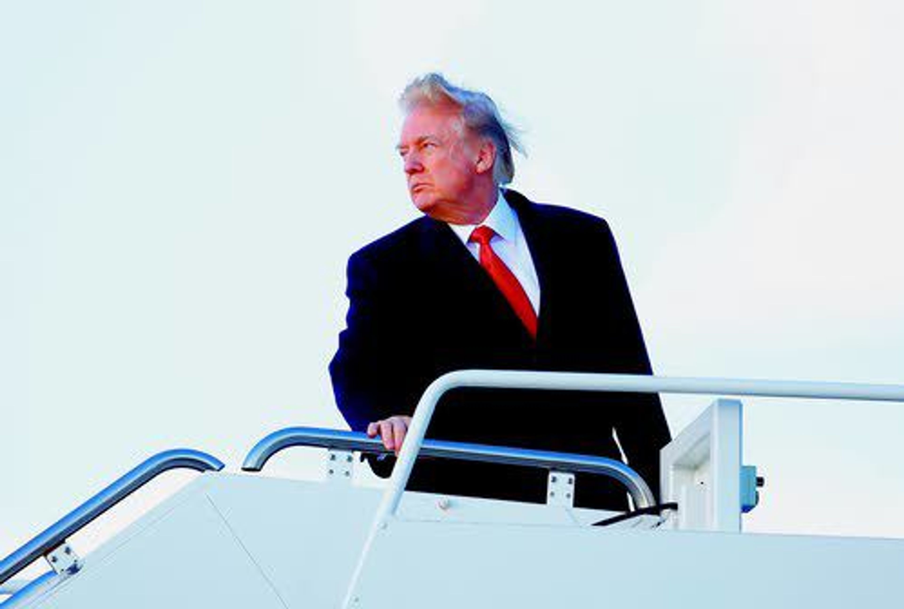 President Donald Trump boards Air Force One on Friday at Andrews Air Force Base, Md., en route to West Palm Beach, Fla. AP Photo/Carolyn Kaster