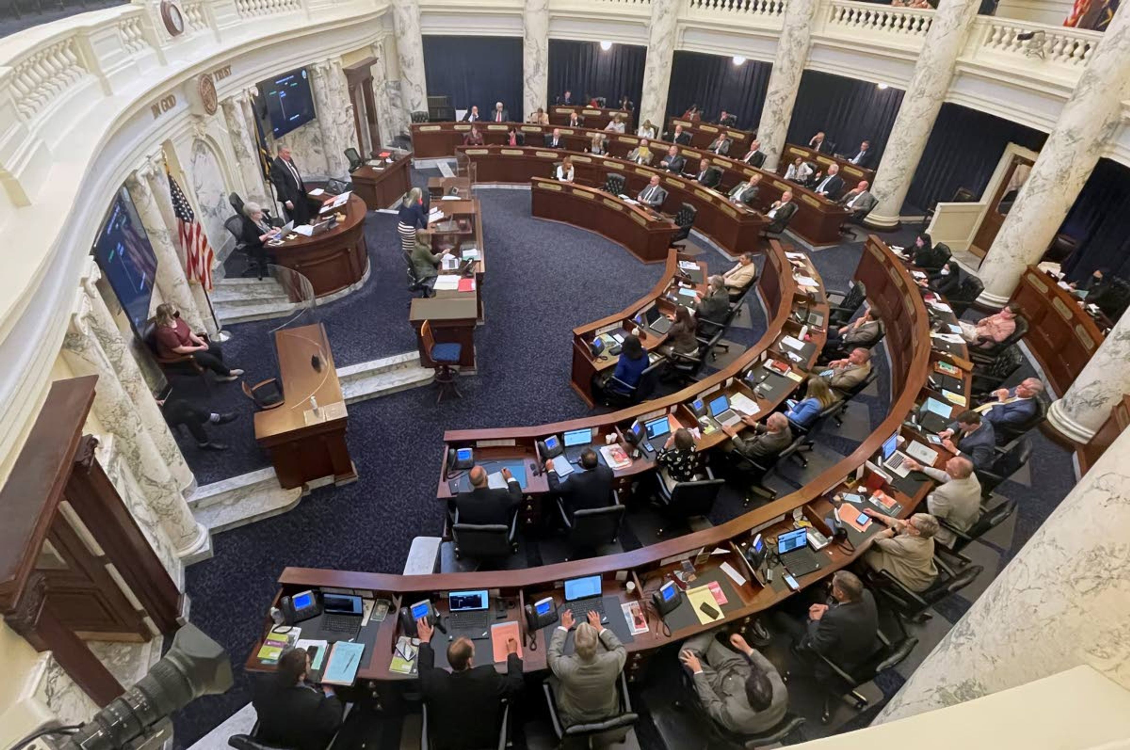 FILE - The Idaho House of Representatives works late into the evening at the Statehouse in Boise, Idaho, in May 2021. (AP Photo/Keith Ridler, File)