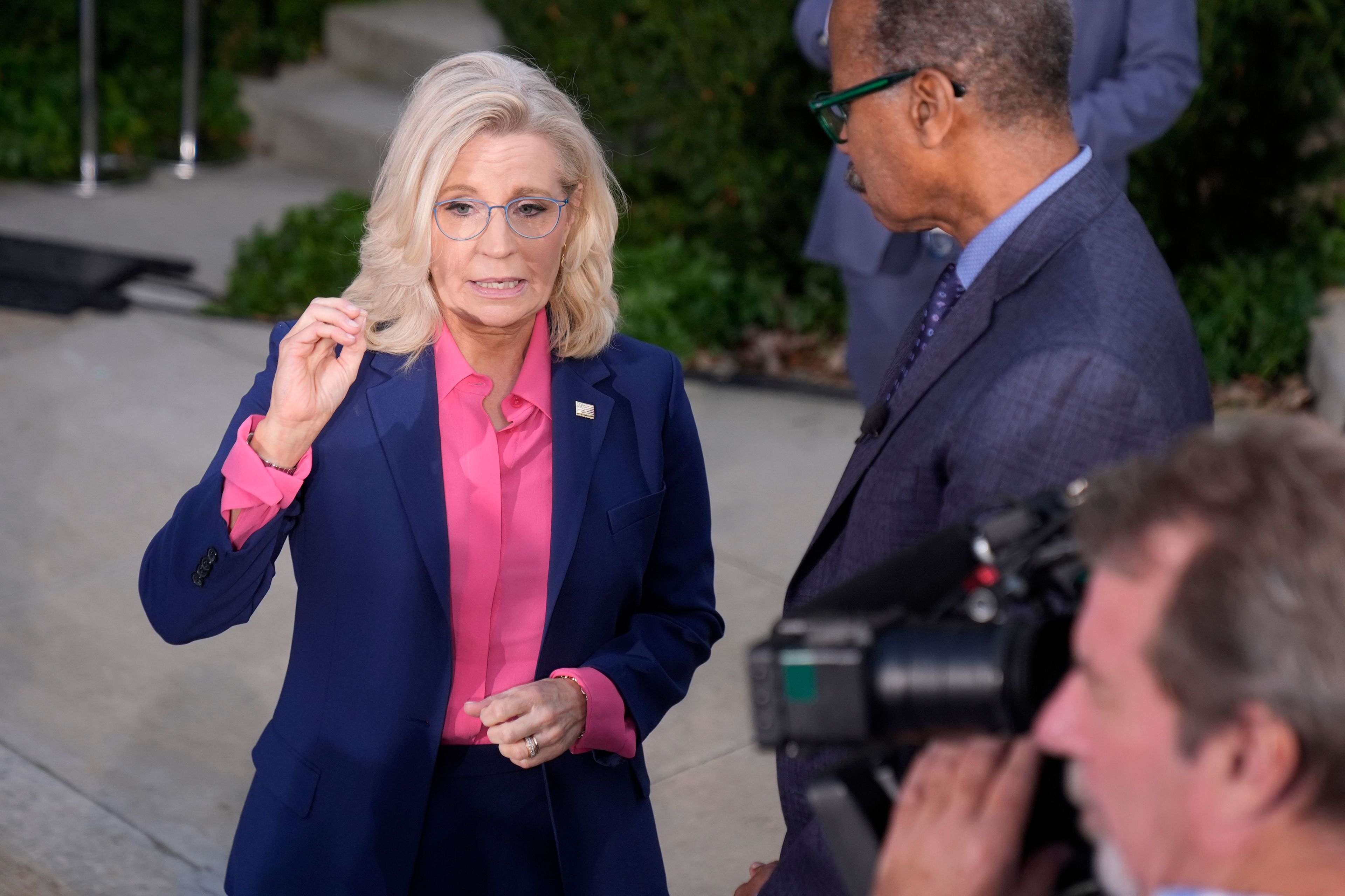 Former Congresswoman Liz Cheney, R-Wyo., left, attends a campaign event for Democratic presidential nominee Vice President Kamala Harris at Ripon College in Ripon, Wis., Thursday, Oct. 3, 2024. (AP Photo/Mark Schiefelbein)