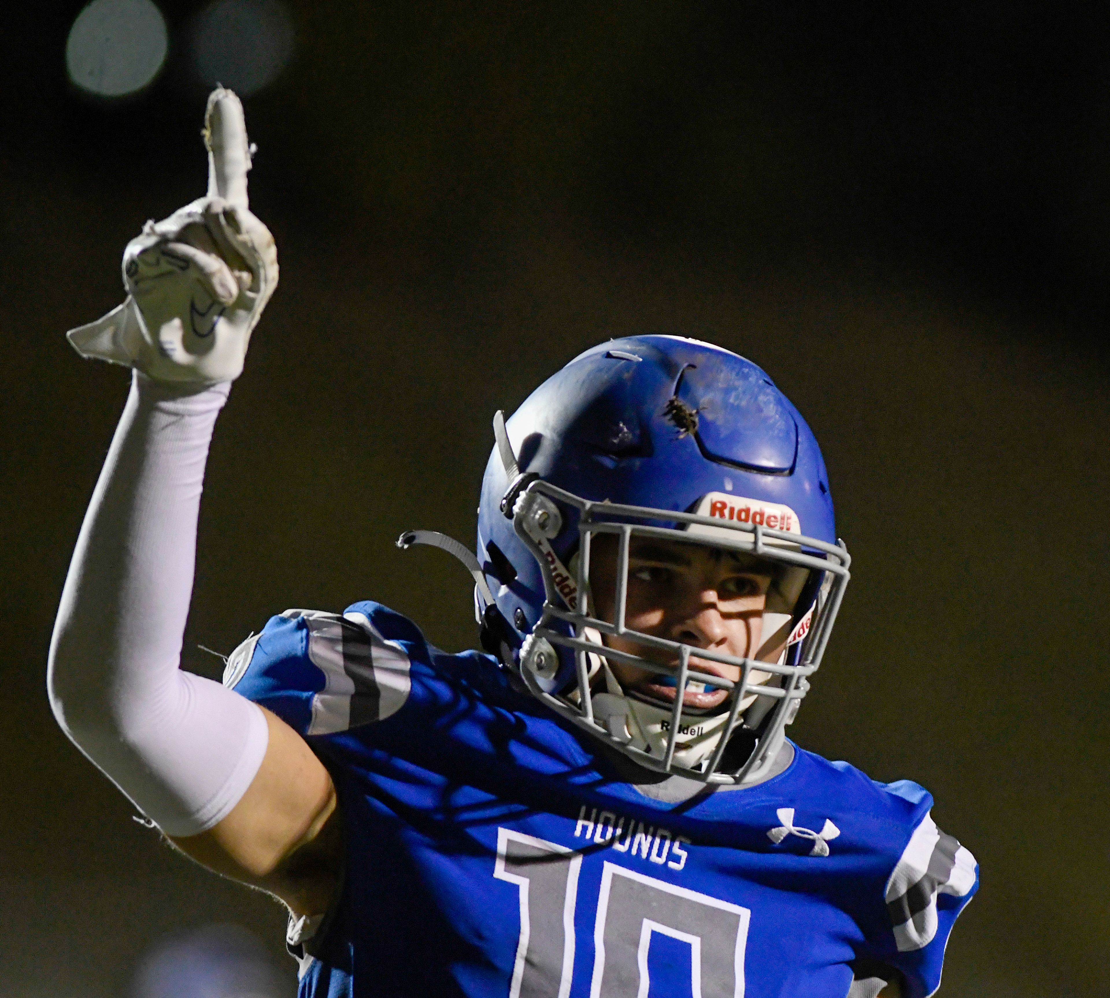 Pullmans Caleb Ratliff raises an arm in celebration of a touchdown catch during a game against Clarkston Friday in Pullman.,