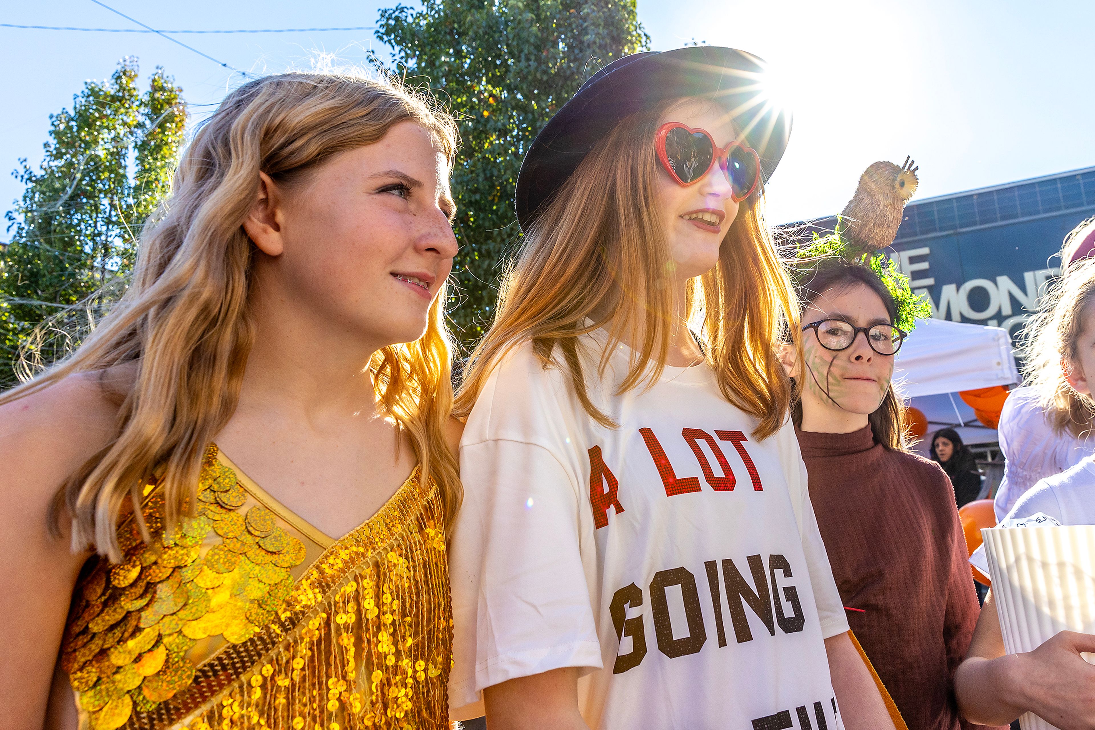 Movie Cannon, right, 12, of Lewiston, and Anna Wells, left, dress as Taylor Swift Saturday at Pumpkin Palooza in downtown Lewiston.,