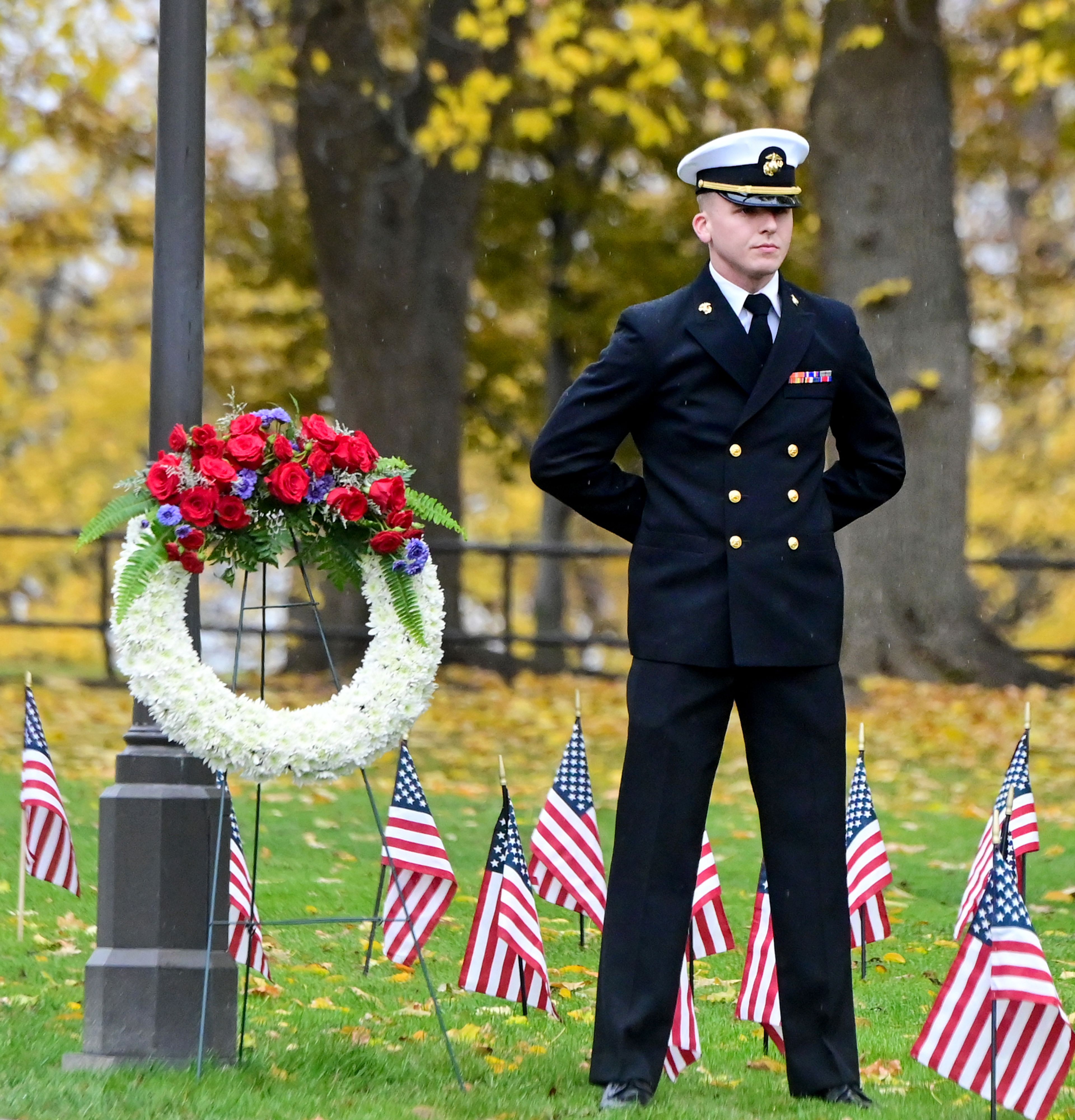 Cody Dotson, right, a midshipmen in the University of Idaho’s ROTC program, stands at ease during the UI Veterans Day ceremony Monday in Moscow.