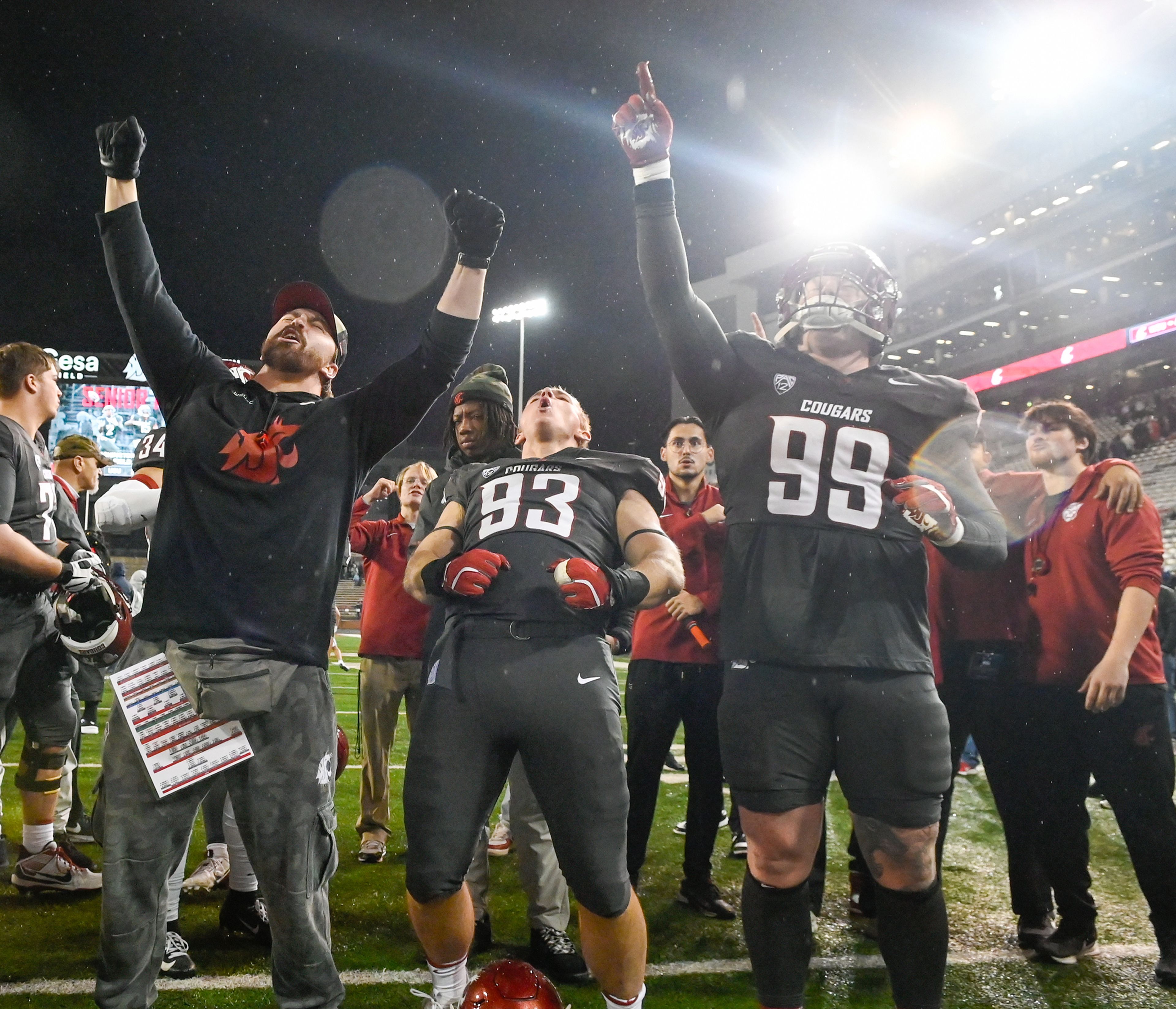 Washington State Cougars cheer after their win over Utah State Saturday at Gesa Field in Pullman.