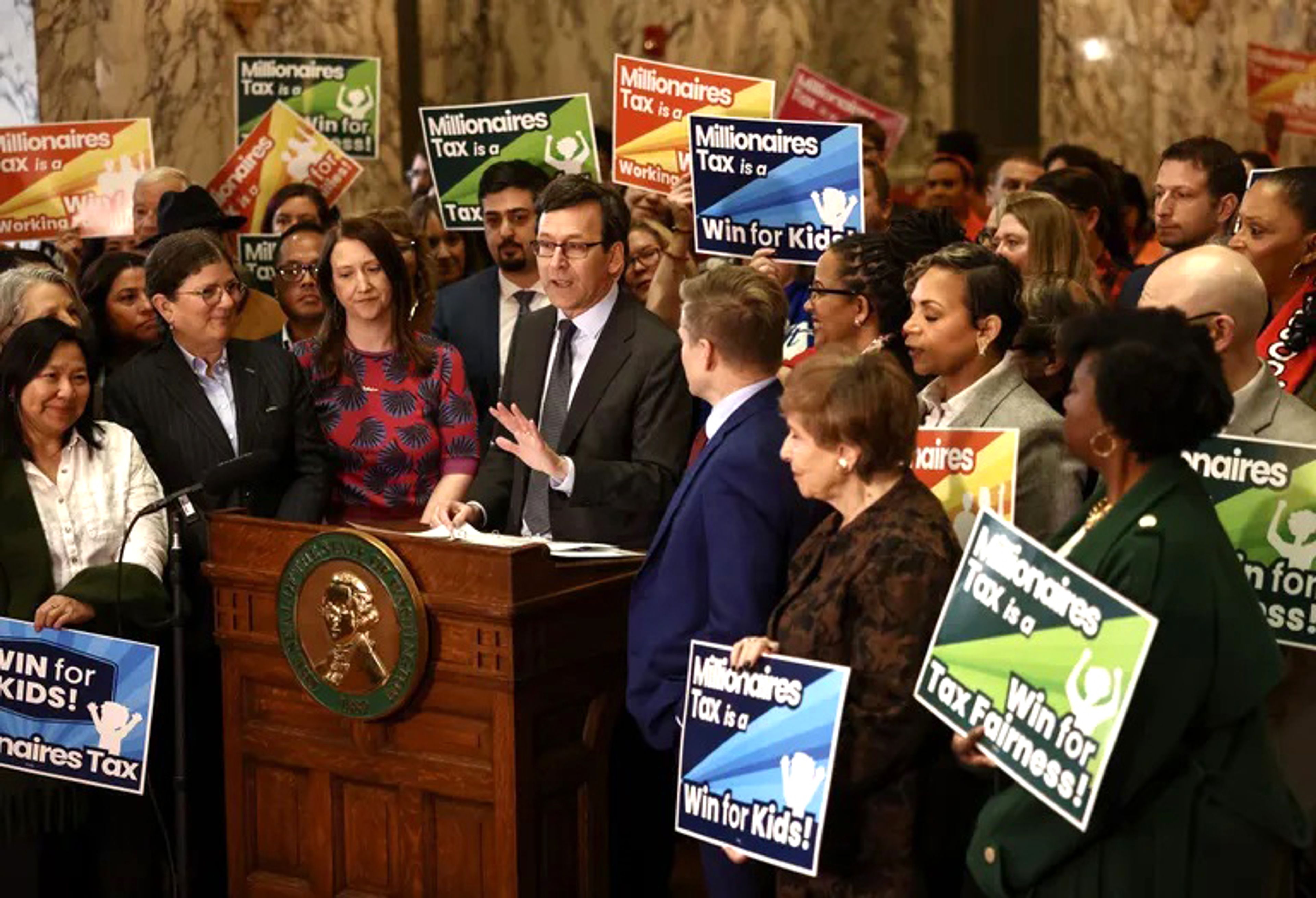 Gov. Bob Ferguson speaks before signing the high-earnings income tax bill at the state Capitol on Monday, March 30, 2026, in OIympia. (Nick Wagner / The Seattle Times)