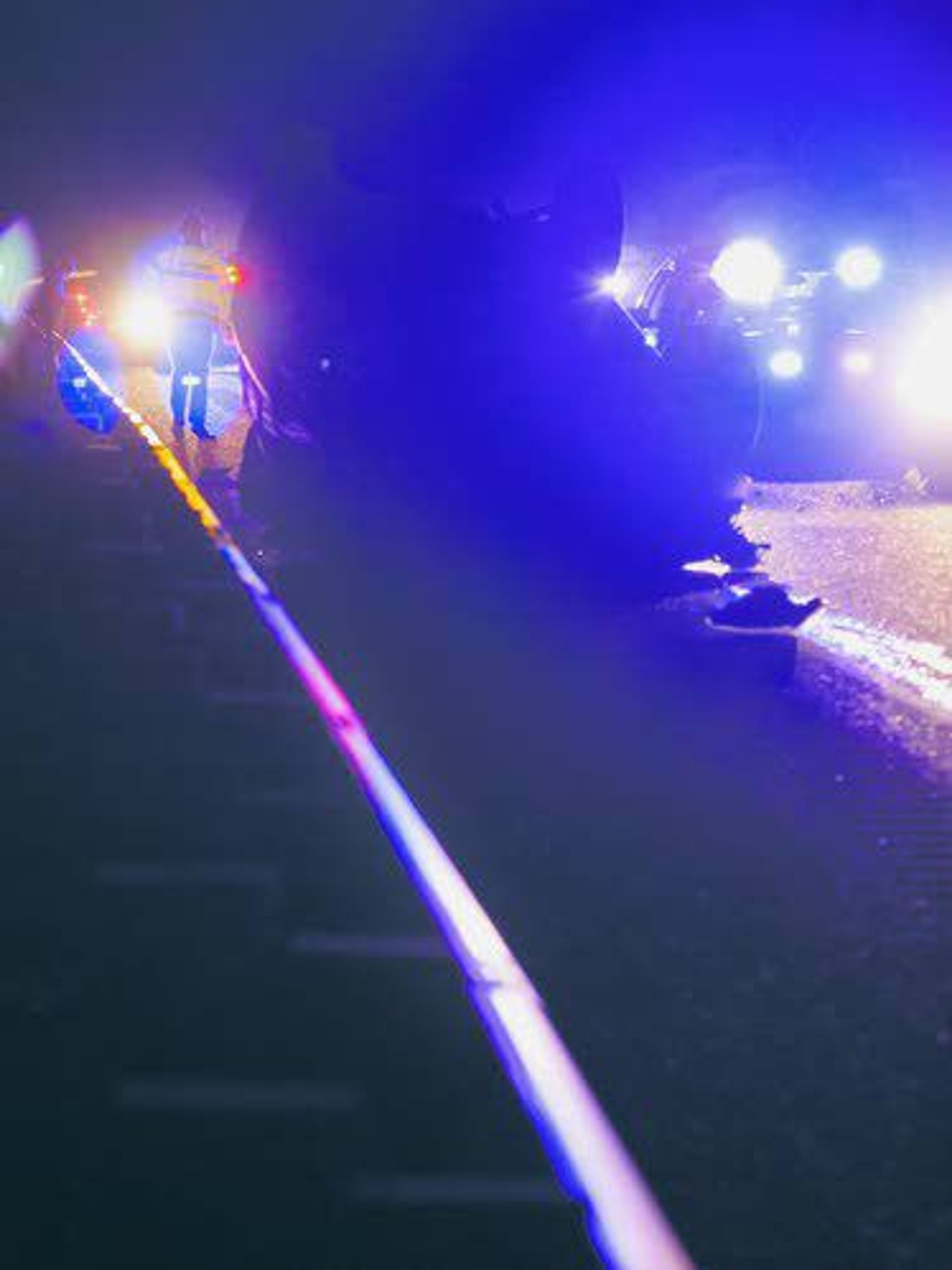 An Idaho State Police trooper stands at the scene of a one-vehicle crash on the Lewiston Grade on Friday afternoon. Ian M. Sullings, 22, of Orofino, was driving south in a gray 2005 Mercury Mariner when he overcorrected while negotiating a curve at about 4:20 p.m., according to an ISP news release. He struck the center barrier, crossed both southbound lanes, overturned and came to rest in the righthand lane. Sullings was wearing a seat belt and was not injured. The lane of U.S. Highway 95 was blocked for about an hour during the investigation. Both southbound lanes were blocked for approximately 10 minutes while a tow truck recovered the vehicle.