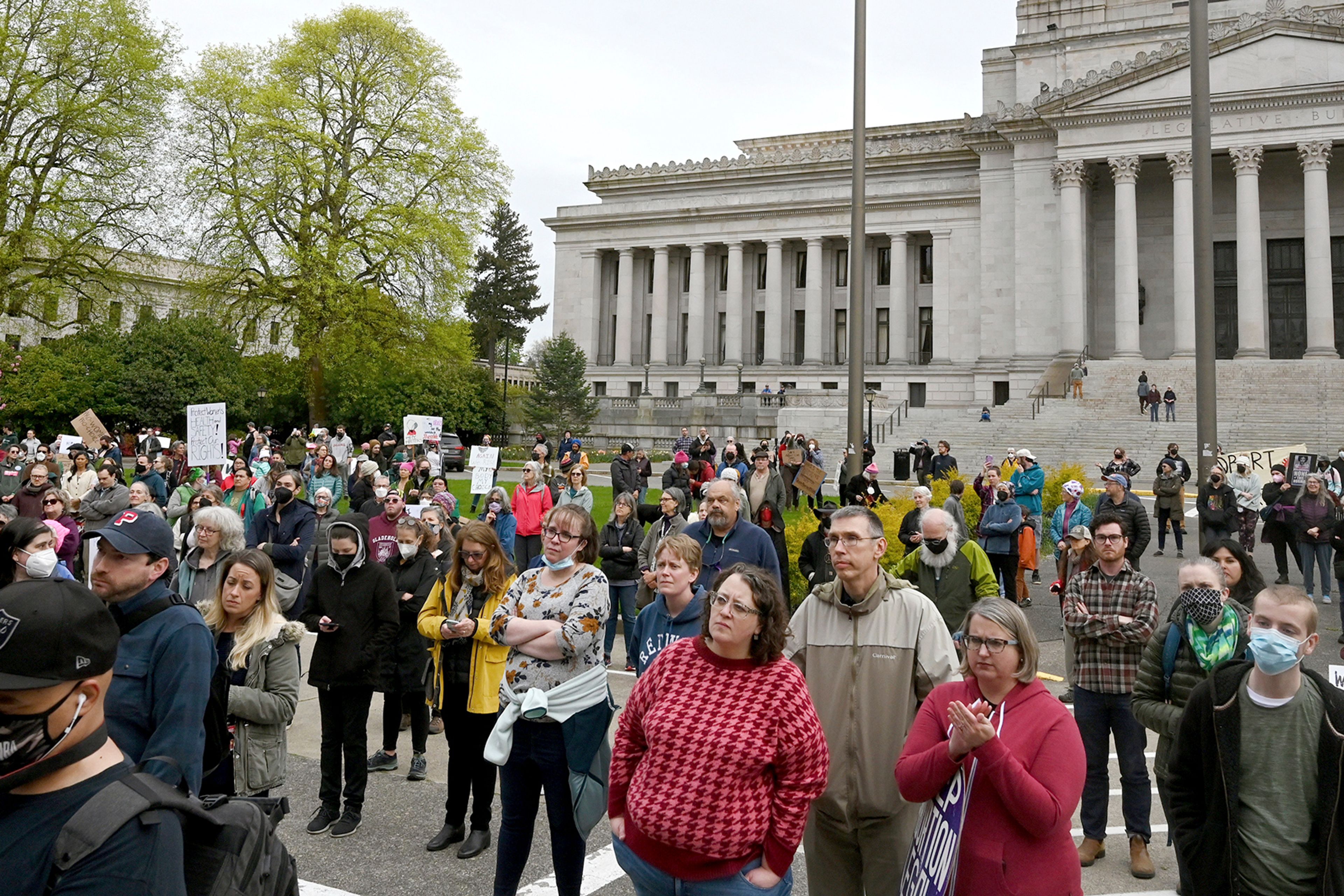 Several hundred pro-choice supporters gather on the steps of the Temple of Justice in Olympia, Wa., Tuesday, May 3, 2022, in response to the news that the U.S. Supreme Court could be poised to overturn the landmark Roe v. Wade case that legalized abortion nationwide. (Steve Bloom/The Olympian via AP)