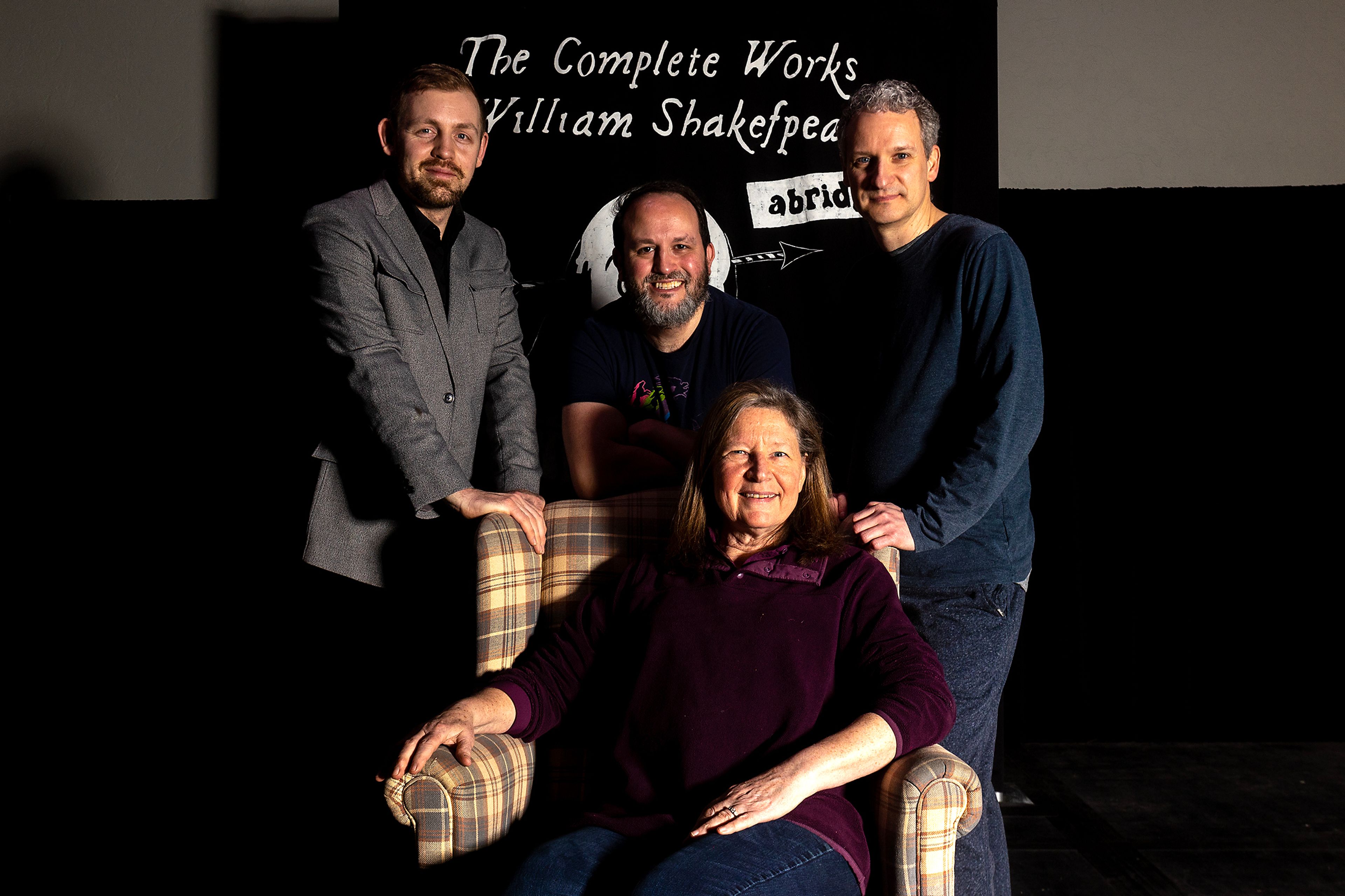 Director Beth Atkinson sits for a photo with the three actors in the play “The Complete Works of William Shakespeare (Abridged).” Standing, from left, are Micheal Keene, Jacob Trickey and Travis Osburn. The play opens Friday at Lindsay Creek Vineyards in Lewiston.