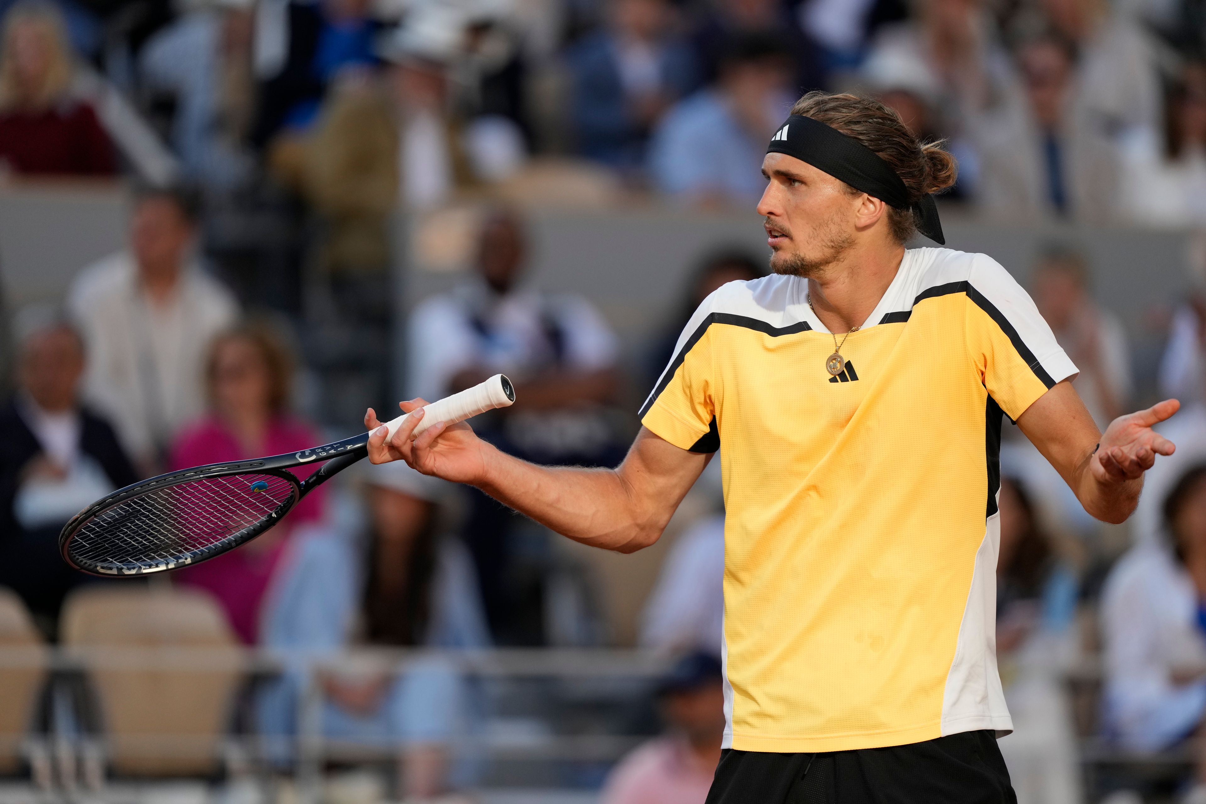 Germany's Alexander Zverev reacts as he plays against Spain's Carlos Alcaraz during the men's final match of the French Open tennis tournament at the Roland Garros stadium in Paris, Sunday, June 9, 2024.