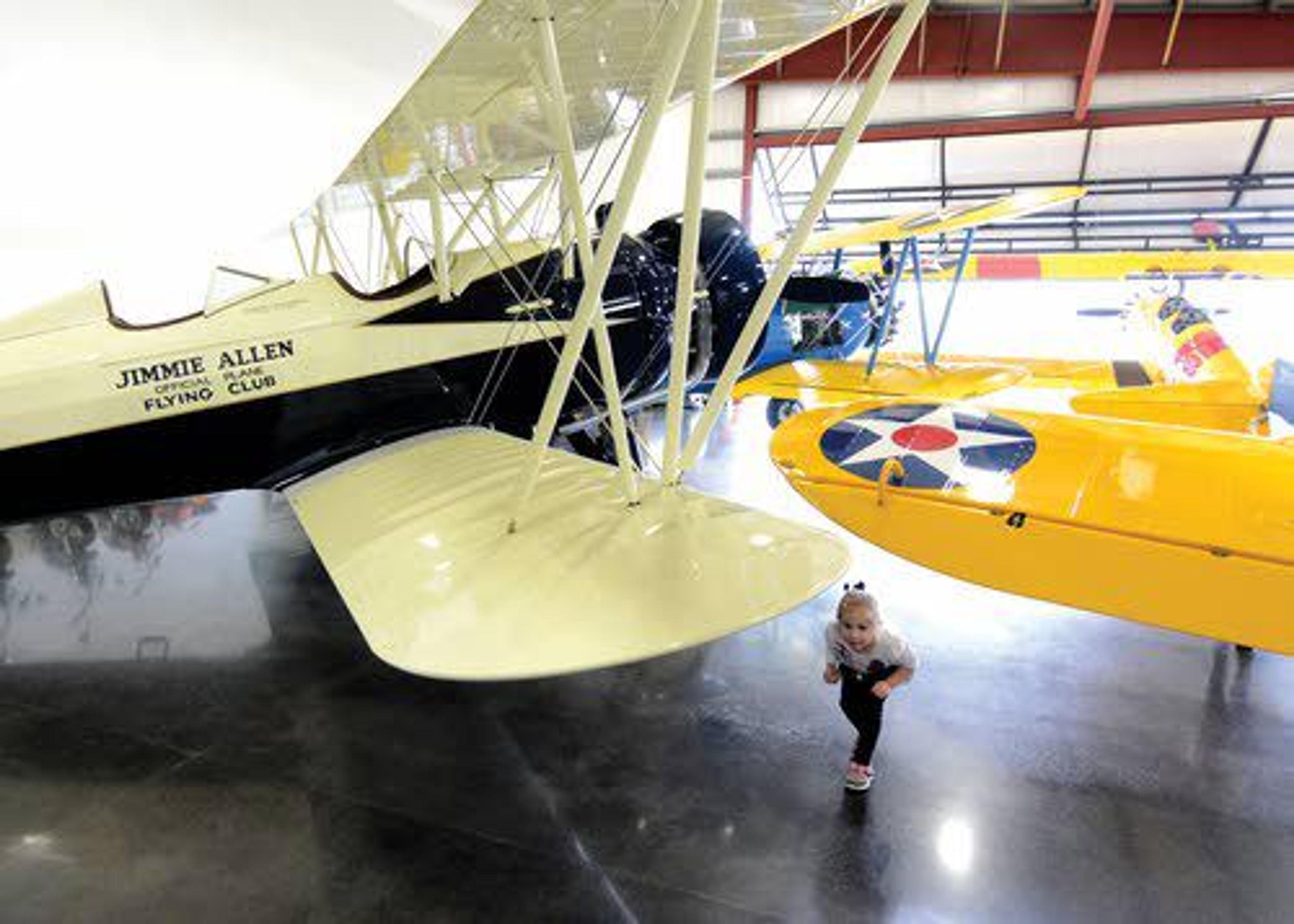 With many wings to walk around, it’s a low bridge for everyone. One of many pristine aircraft is the Stearman Speedmail, owned and used by Richfield Oil Co. in the 1930s to promote their products and the Jimmie Allen Flying Club for kids.