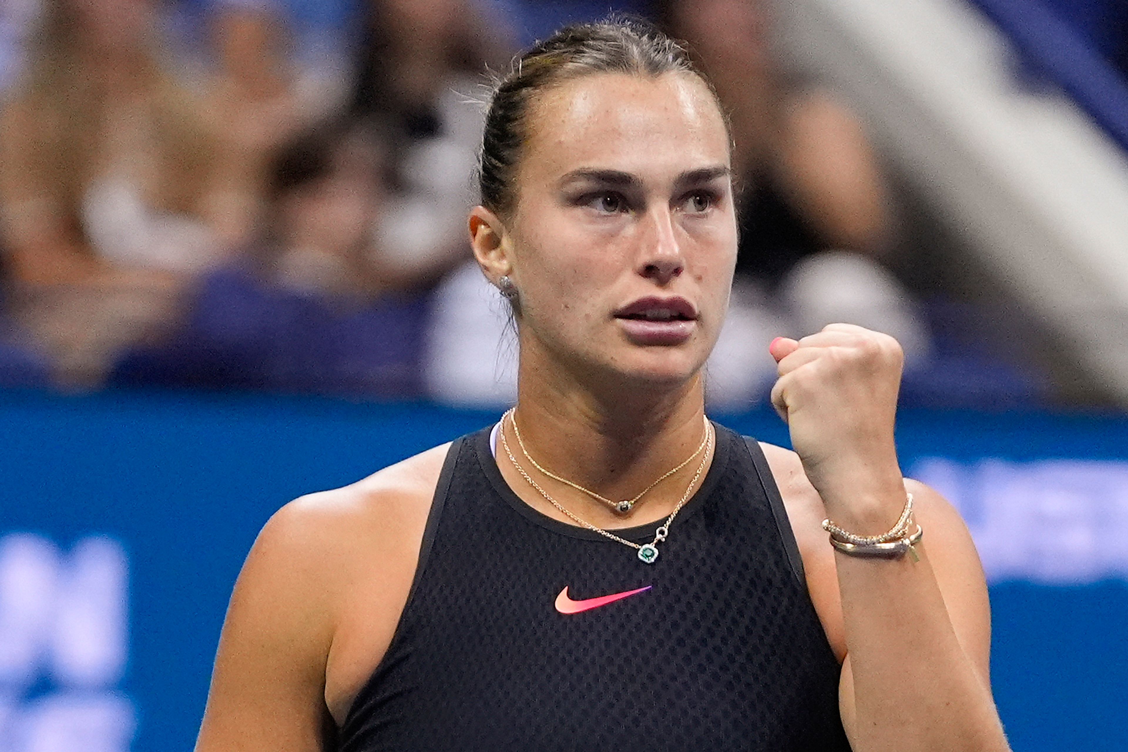 Aryna Sabalenka, of Belarus, reacts after scoring a point against Emma Navarro, of the United States, during the women's singles semifinals of the U.S. Open tennis championships, Thursday, Sept. 5, 2024, in New York.