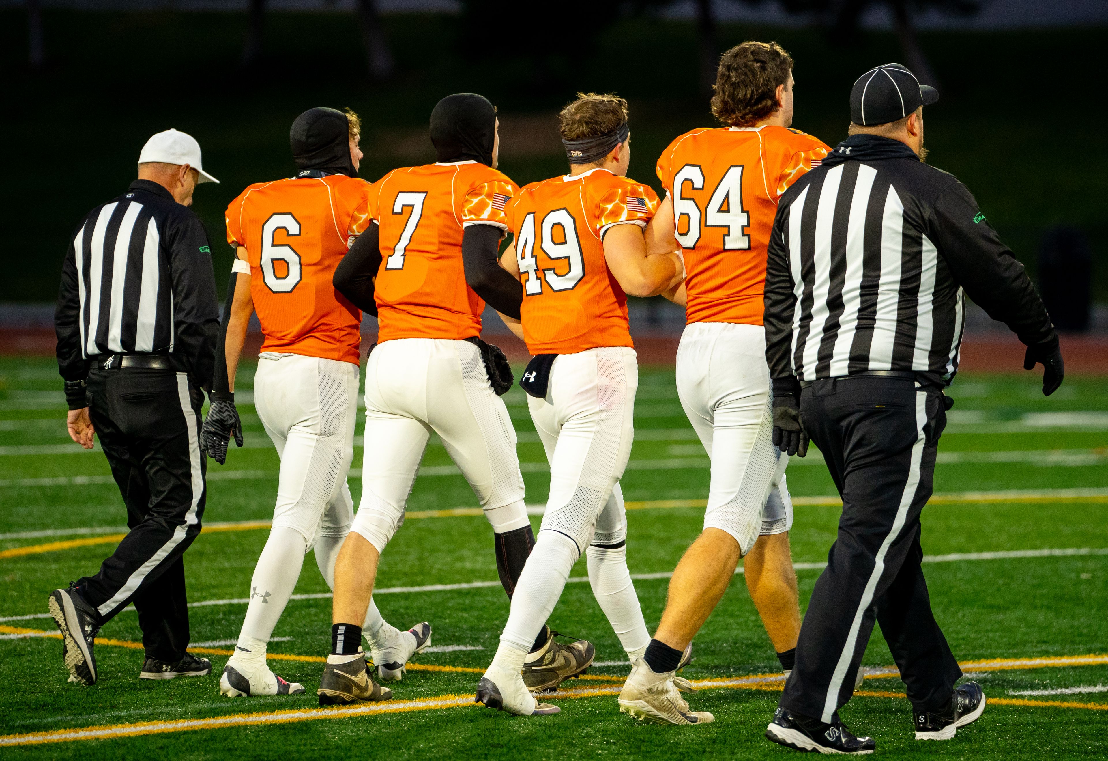 Asotin's football captains take to the field before a semifinal game against Napavine in the Washington 2B state tournament Saturday in Richland.