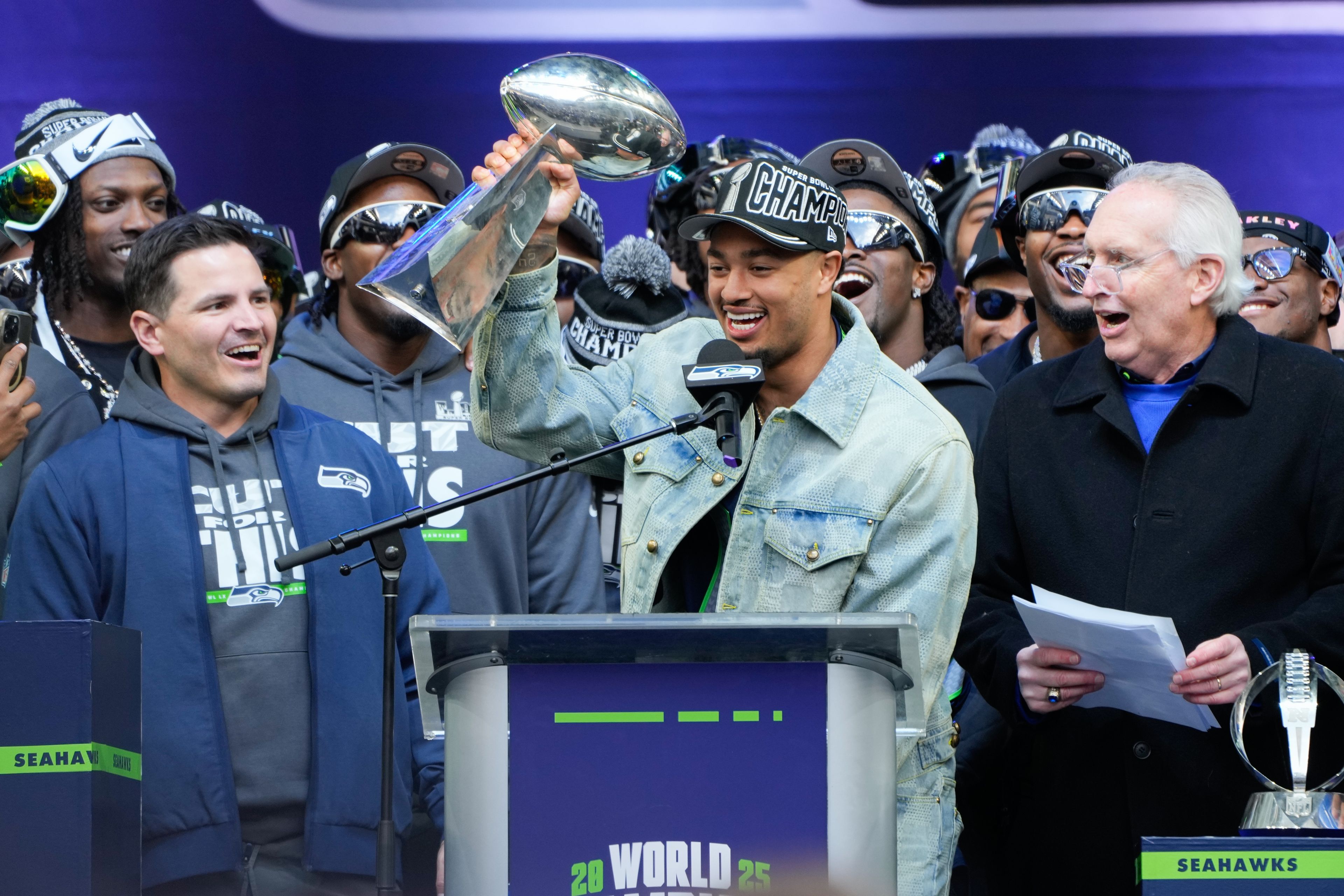 Seattle Seahawks wide receiver Jaxon Smith-Njigba holds the Lombardi Trophy during the team’s NFL football Super Bowl 60 celebration at Lumen Field, Feb. 11, in Seattle.