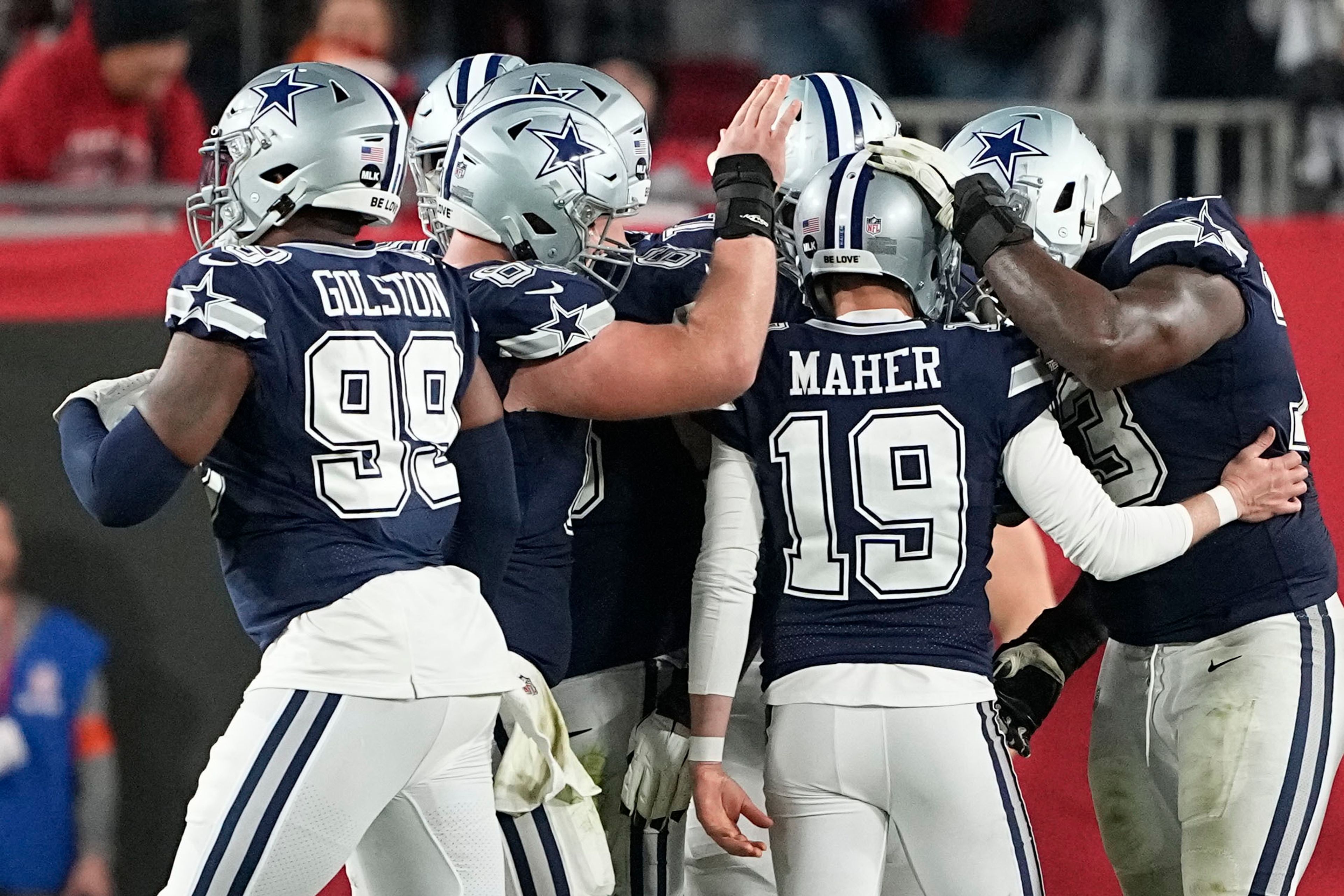 Dallas Cowboys place kicker Brett Maher (19) is congratulated after his extra point against the Tampa Bay Buccaneers during the second half of an NFL wild-card football game, Monday, Jan. 16, 2023, in Tampa, Fla. (AP Photo/Chris Carlson)