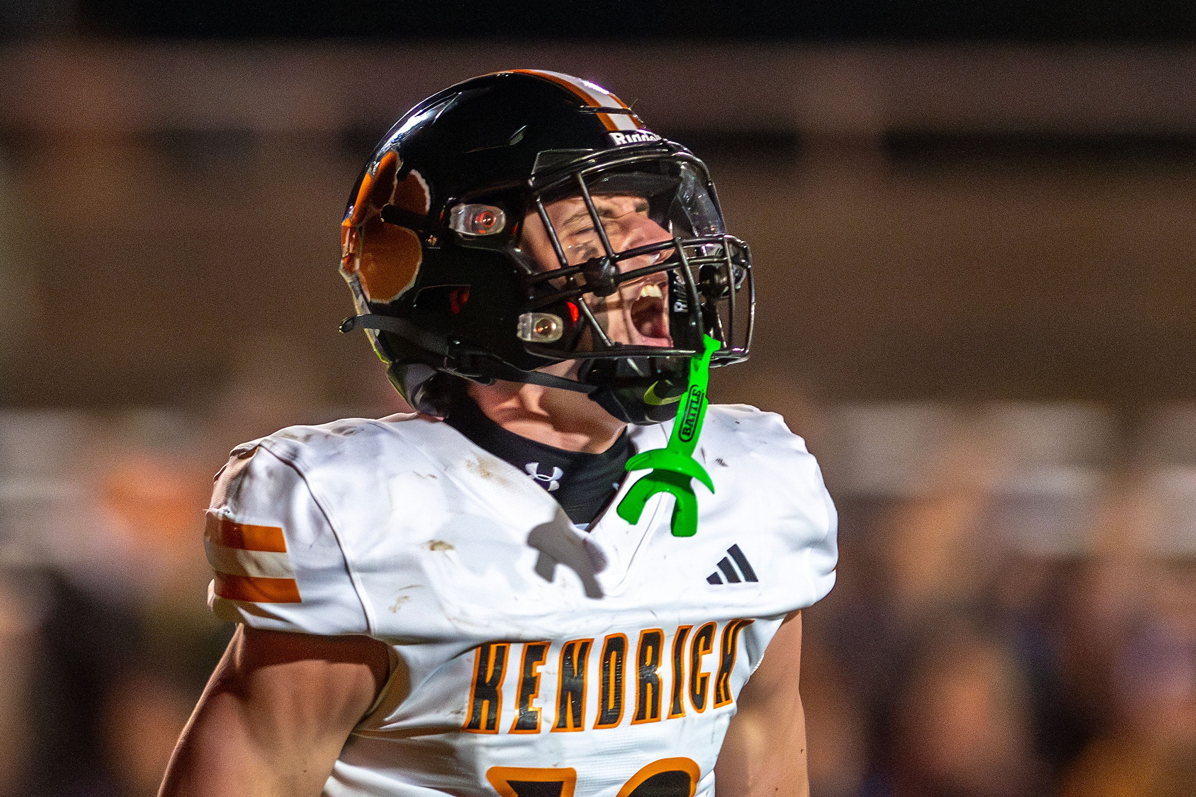 Kendrick running back Sawyer Hewett lets out a yell after a touchdown against Logos in a semifinal game of the Idaho State Football Class 2A Championships Friday at Bengal Field in Lewiston.