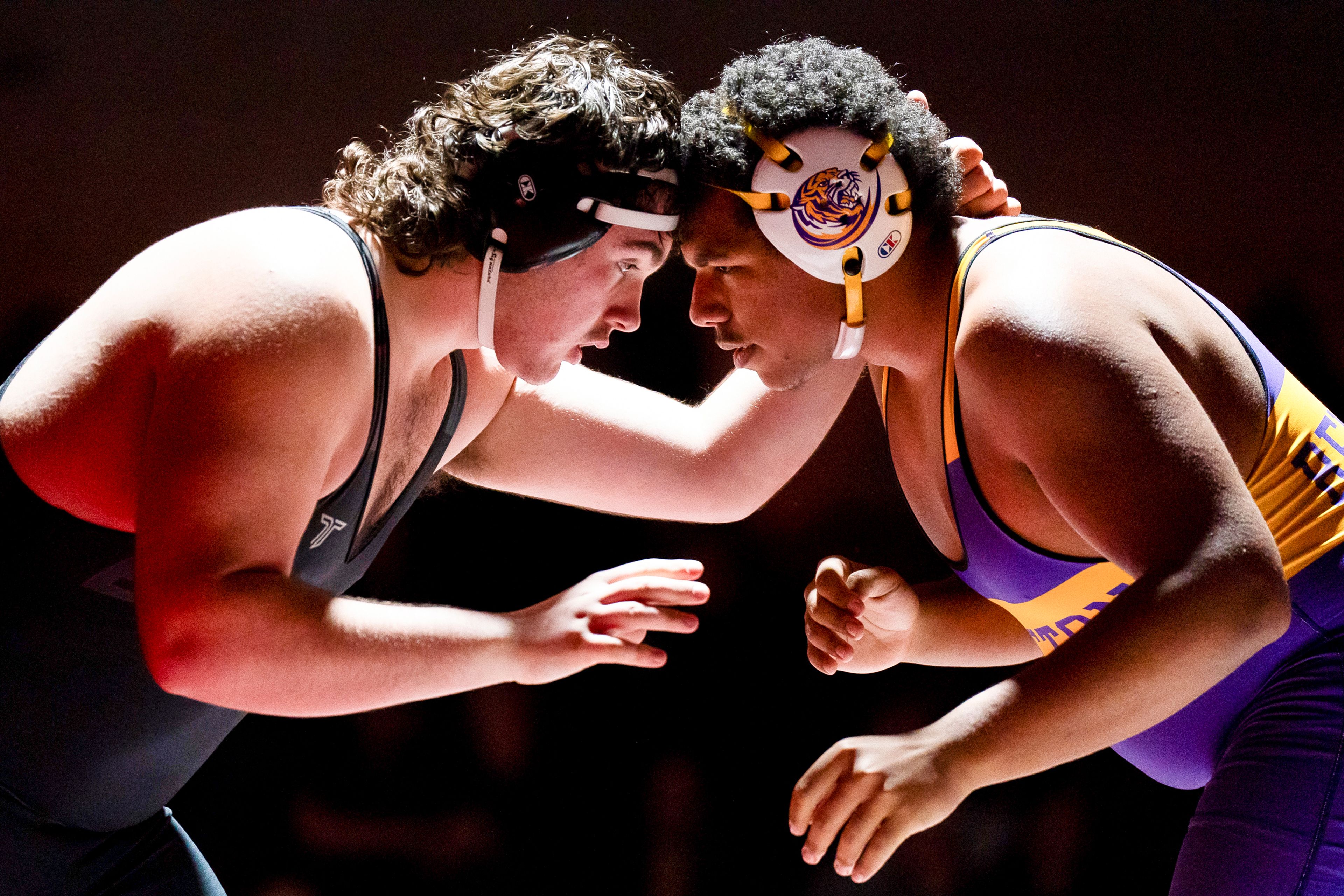 Clarkston’s Justyn Watters, left, grapples with Lewiston’s David Rhodes during a 285-pound match Jan. 24 at Kramer Gym in Clarkston.