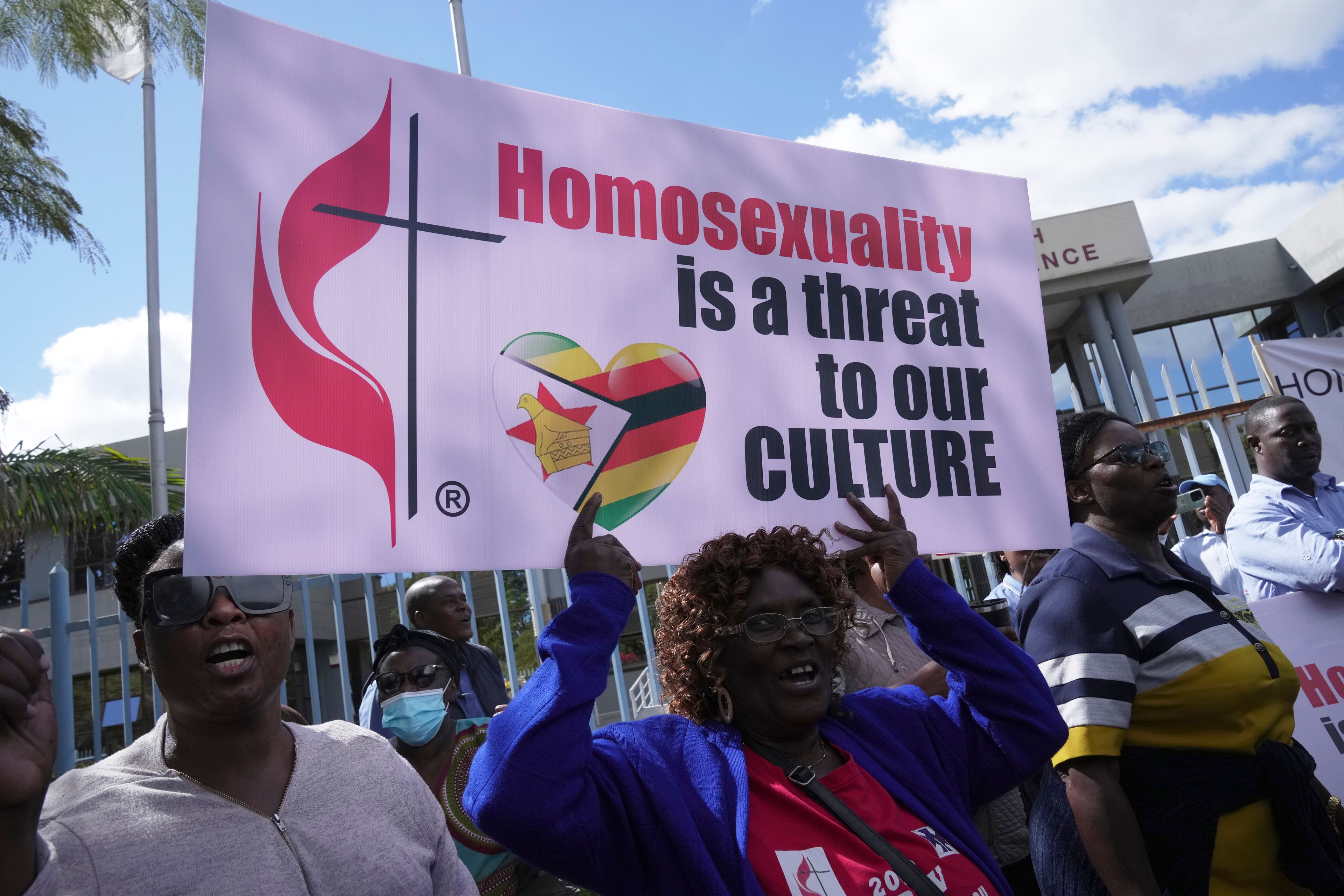 Members of the United Methodist Church in Zimbabwe hold placards while holding a protest at the church premises in Harare, Thursday, May 30, 2024. The protests denouncing homosexuality and the departure of the church from the scriptures and doctrine, come barely a month after the United Methodist Church Worldwide General Conference held in North Carolina, US repealed their church's longstanding ban on LGBTQ clergy, removing a rule forbidding "self-avowed practising homosexuals" from being ordained or appointed as ministers.