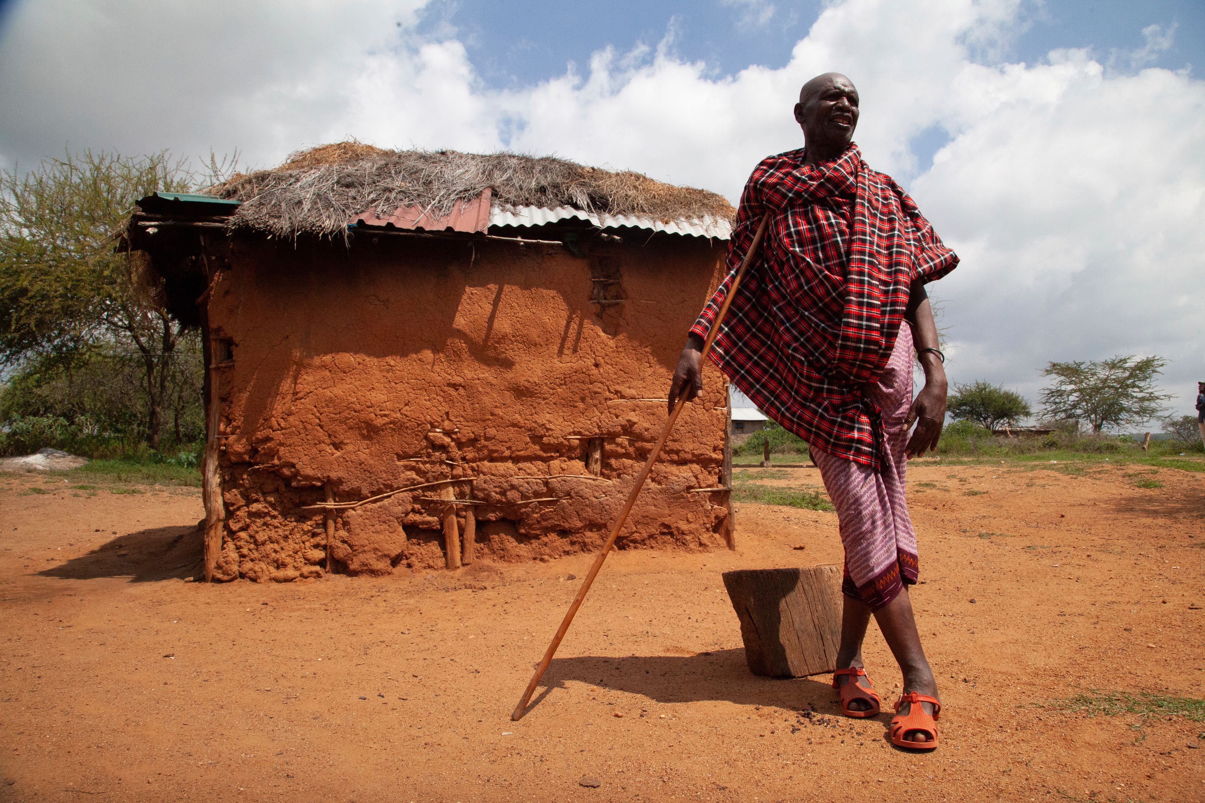 Lesian Ole Sempere, Samburu elder, poses for a photograph outside his house in Lekiji Village, Laikipia county, Kenya, Friday, July 26, 2024.