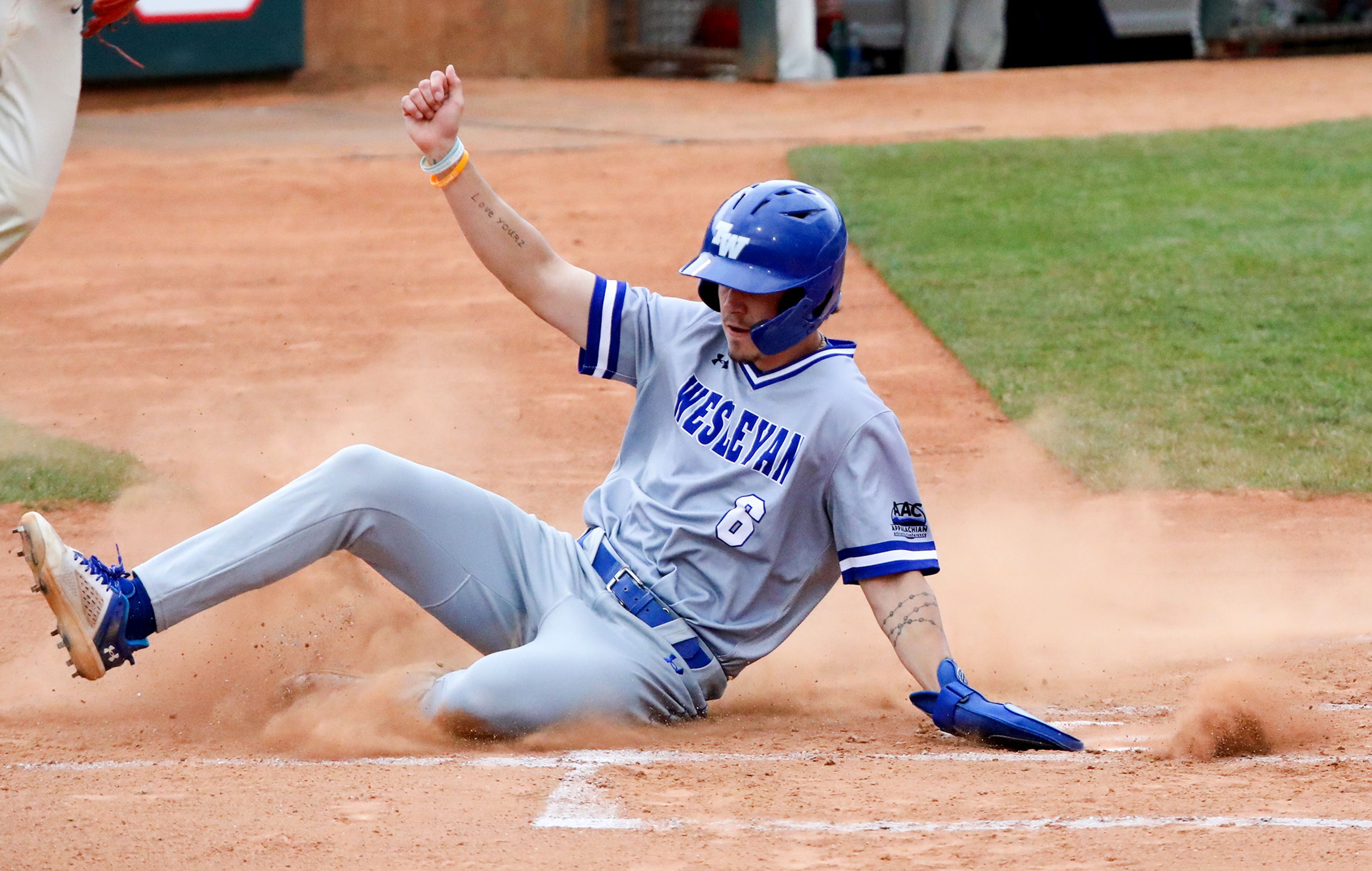 Tennessee Wesleyan’s Braxton Turner slides into home base for a run against the Cumberlands on the opening day of the NAIA World Series at Harris Field in Lewiston on Friday.