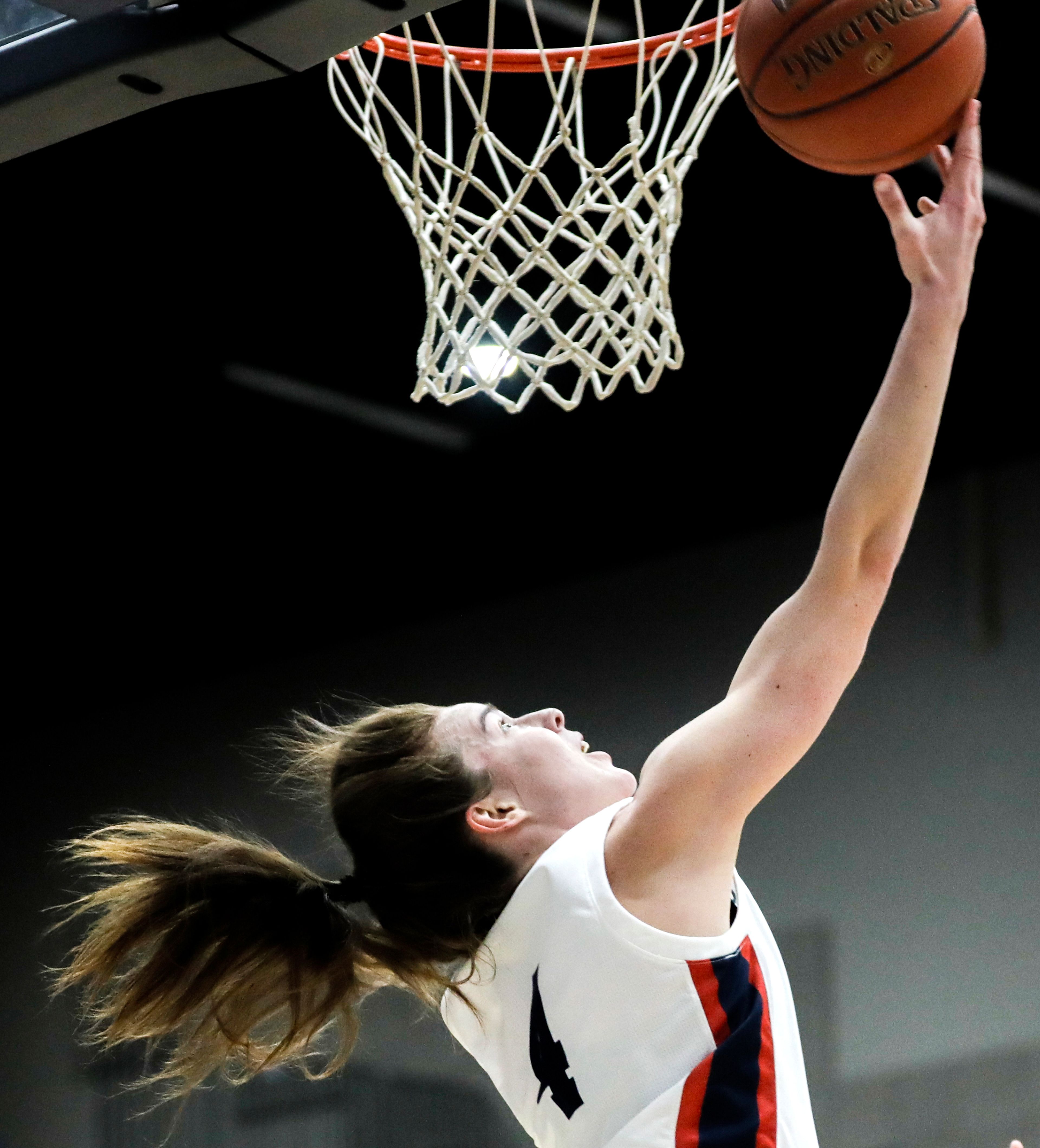 Lewis-Clark State guard Ellie Sander shoots a layup against College of Idaho during a Cascade Conference tournament quarterfinal game on Feb. 27 in Lewiston.