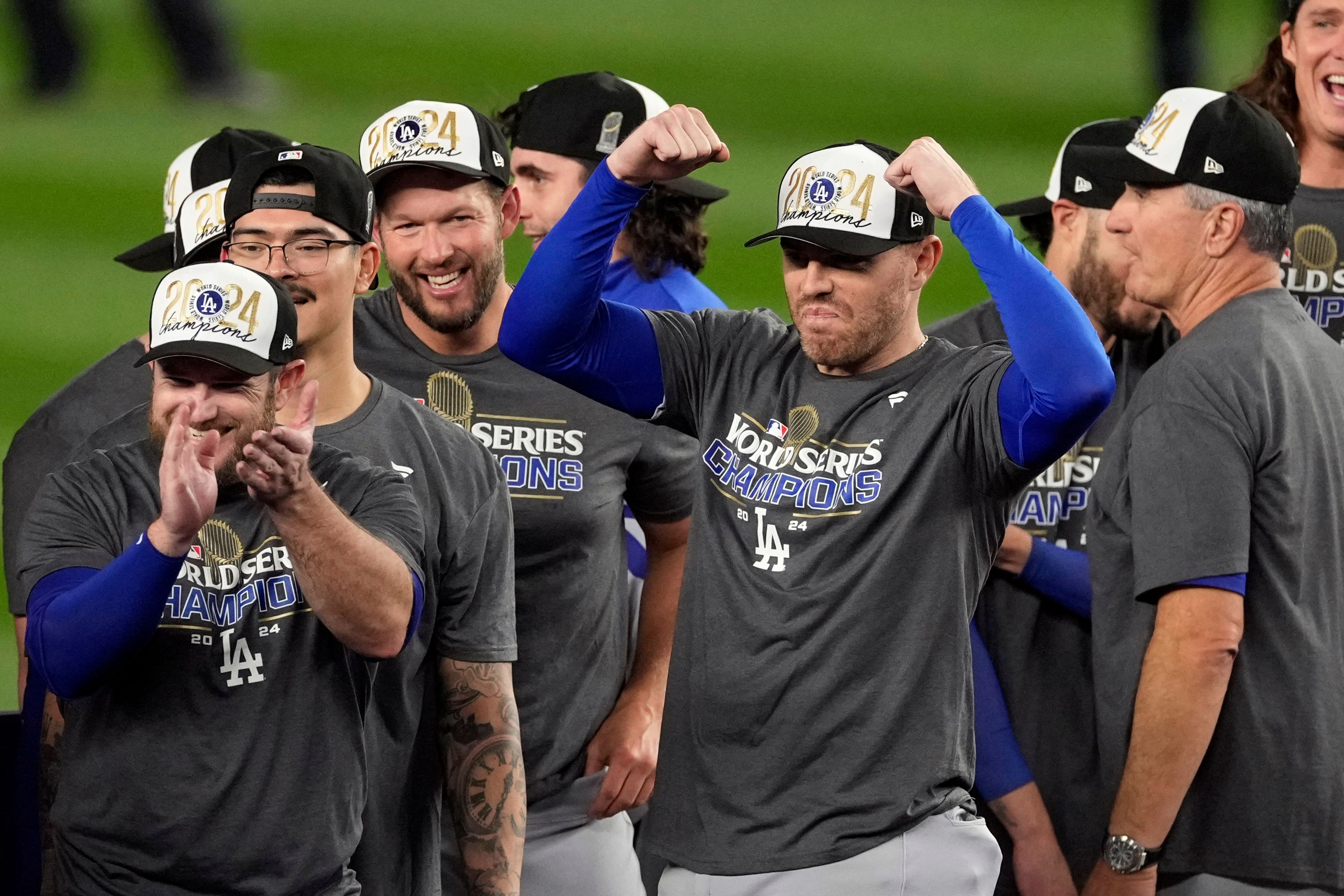 Los Angeles Dodgers' Freddie Freeman celebrates after the Dodgers beat the New York Yankees in Game 5 to win the baseball World Series, Thursday, Oct. 31, 2024, in New York. (AP Photo/Seth Wenig)