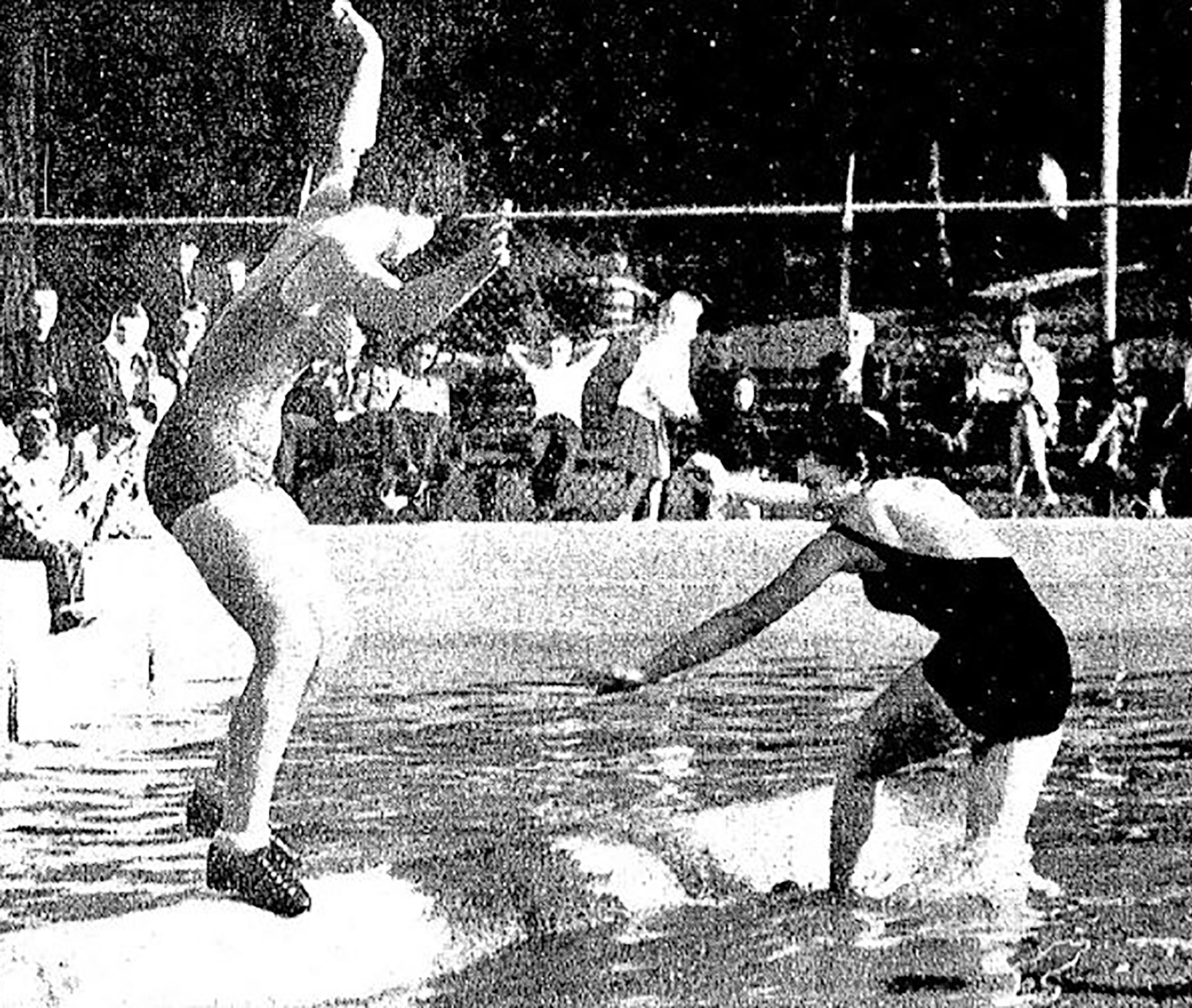 CHAMPIONS BIRL � Barbara Peterka, left, reigning women's champion birler, used some fancy footwork at the Lewiston municipal swimming pool yesterday afternoon to spill Bette Ellis, the former champion. The two young women presented a birling demonstration as part of the opening events for Nation Forest Products Week.