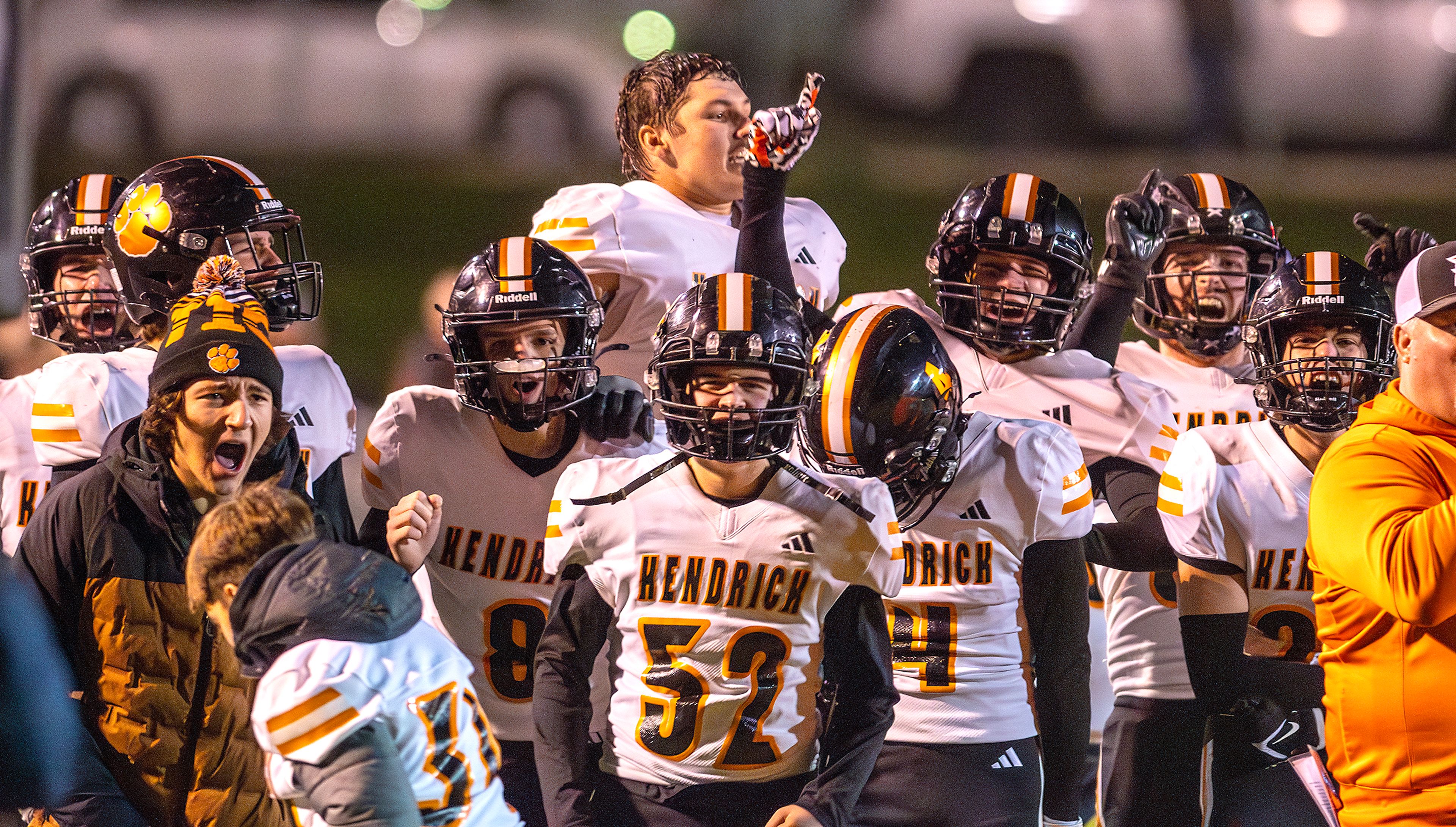 Kendrick cheers as they score a touchdown against Logos in a semifinal game of the Idaho State Football Class 2A Championships Friday at Bengal Field in Lewiston.