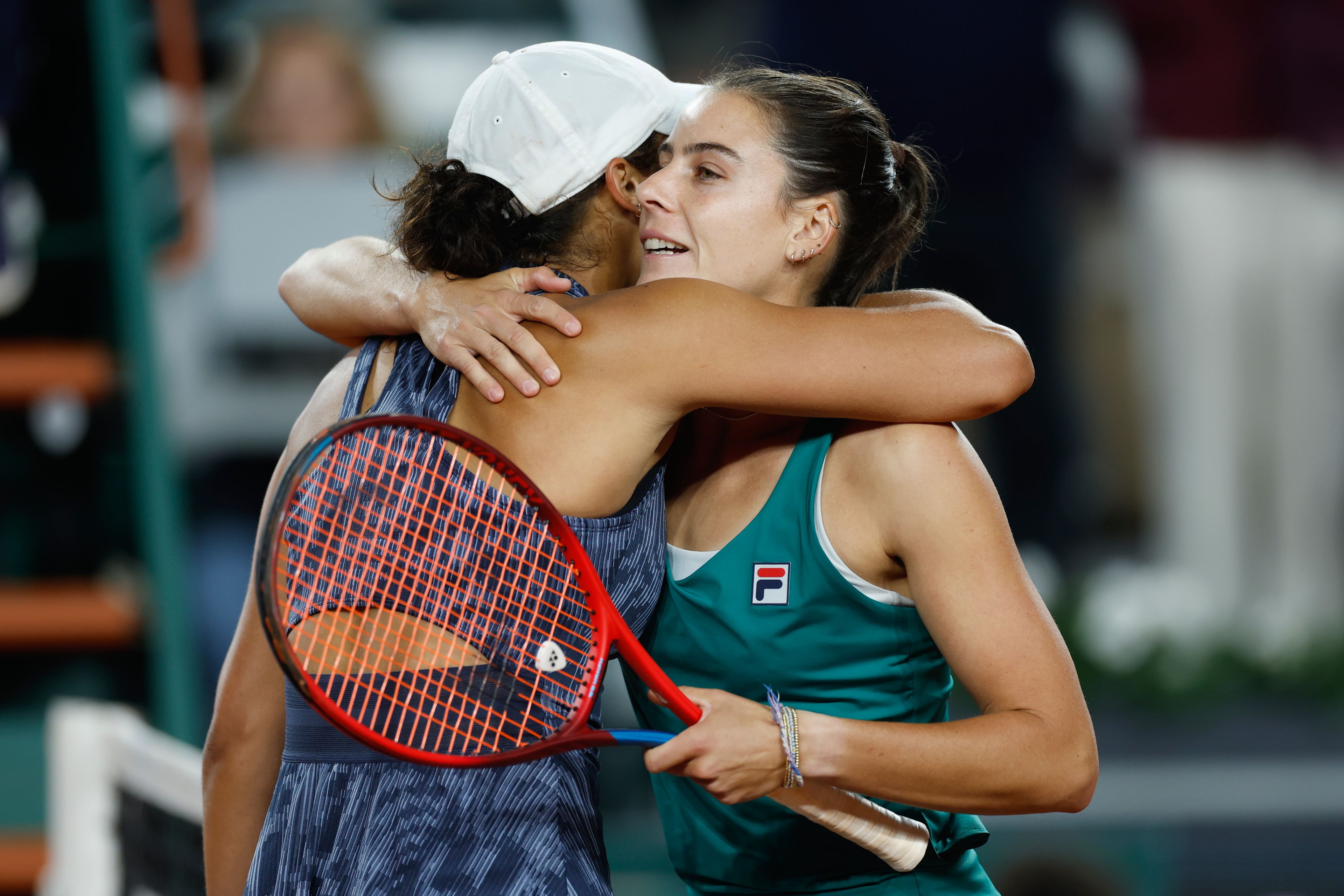 Emma Navarro of the U.S., right, is congratulated by Madison Keys of the U.S. after Navarro won their third round match of the French Open tennis tournament at the Roland Garros stadium in Paris, Saturday, June 1, 2024.