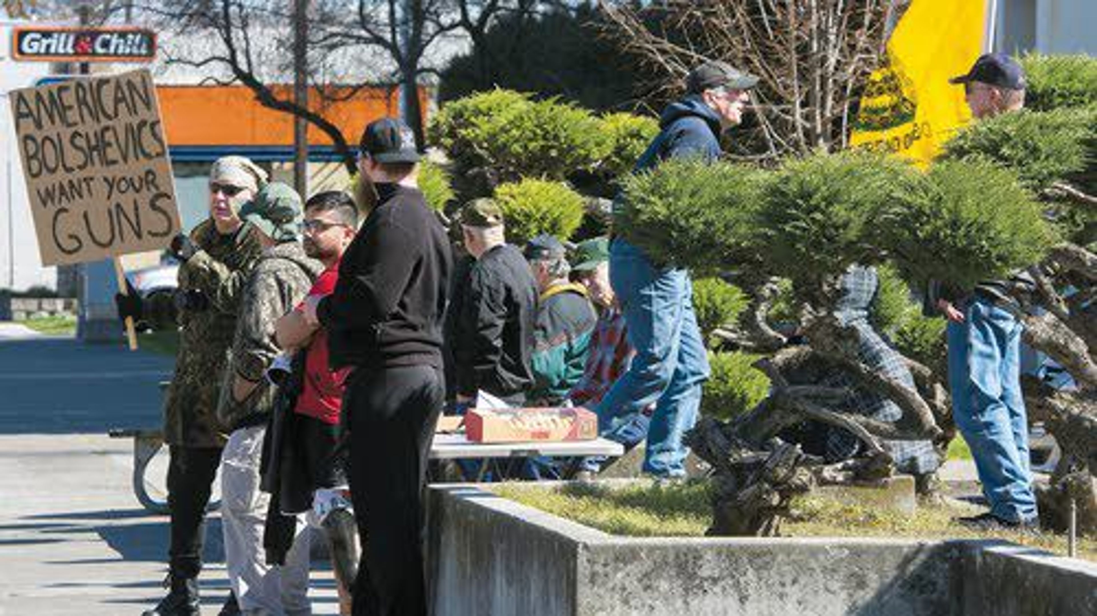 Gun-rights supporters stand along Main Street in Lewiston outside of the Nez Perce County Courthouse for a pro second amendment rally on Saturday afternoon.