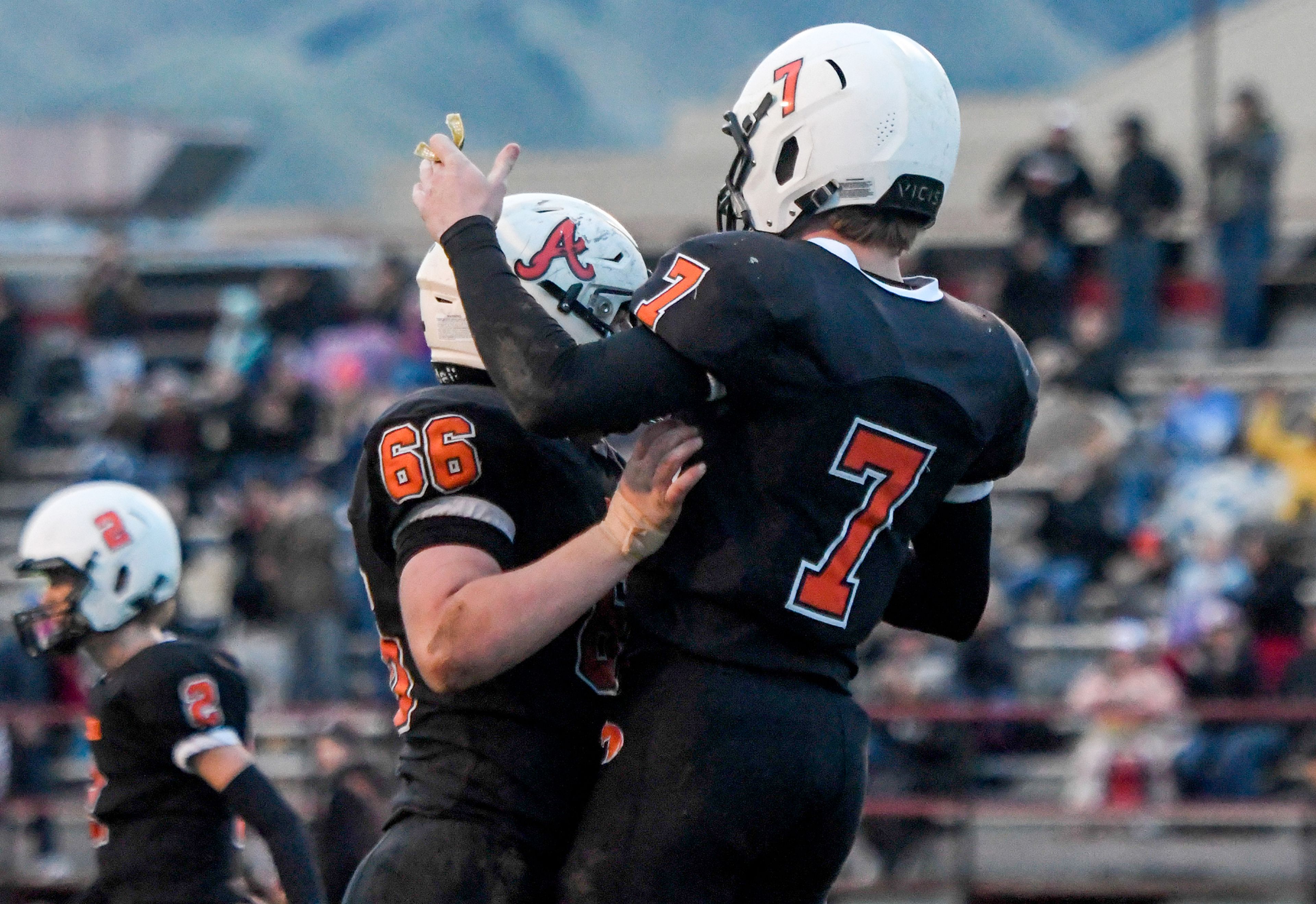 Asotin’s Austin Stein, left, celebrates with Cody Ells after a touchdown by Ells against La Salle Saturday during a Washington 2B state tournament game in Clarkston.