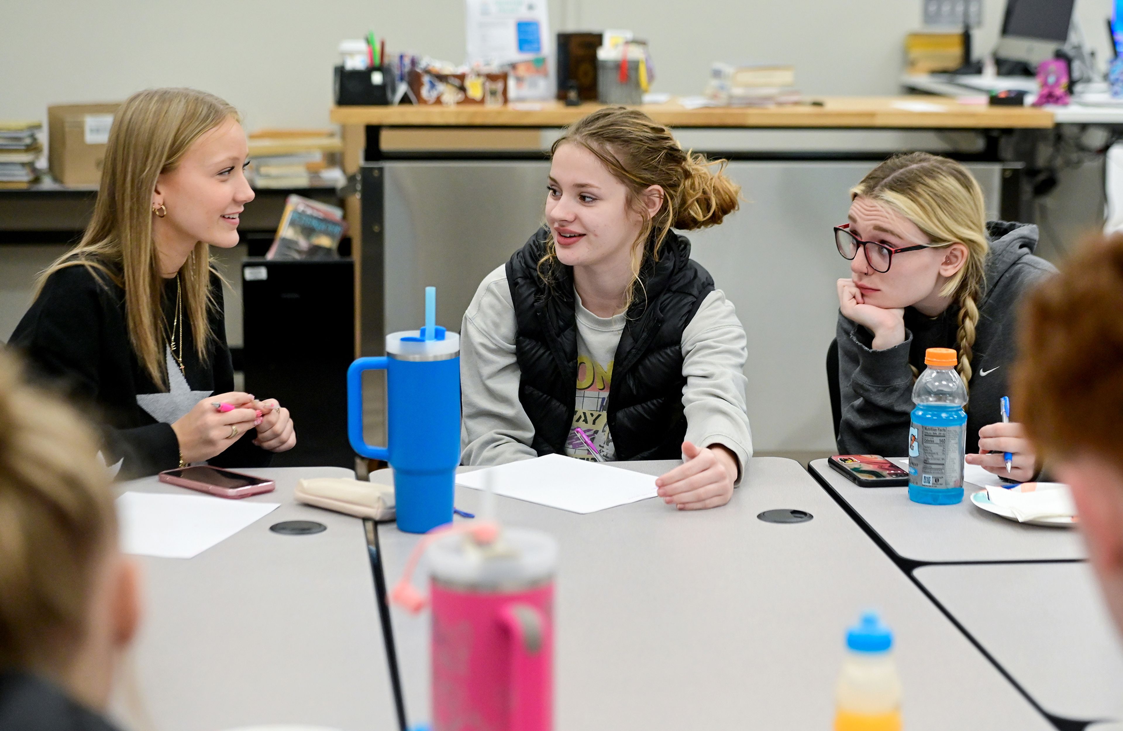 Tammany High School junior Eliza Nick, left, and seniors Heidi Spitzer, center, and Gracie Pearson talk through ideas for a mission statement for the Students of the Valley Advocacy during a group meeting Monday at Asotin High School.