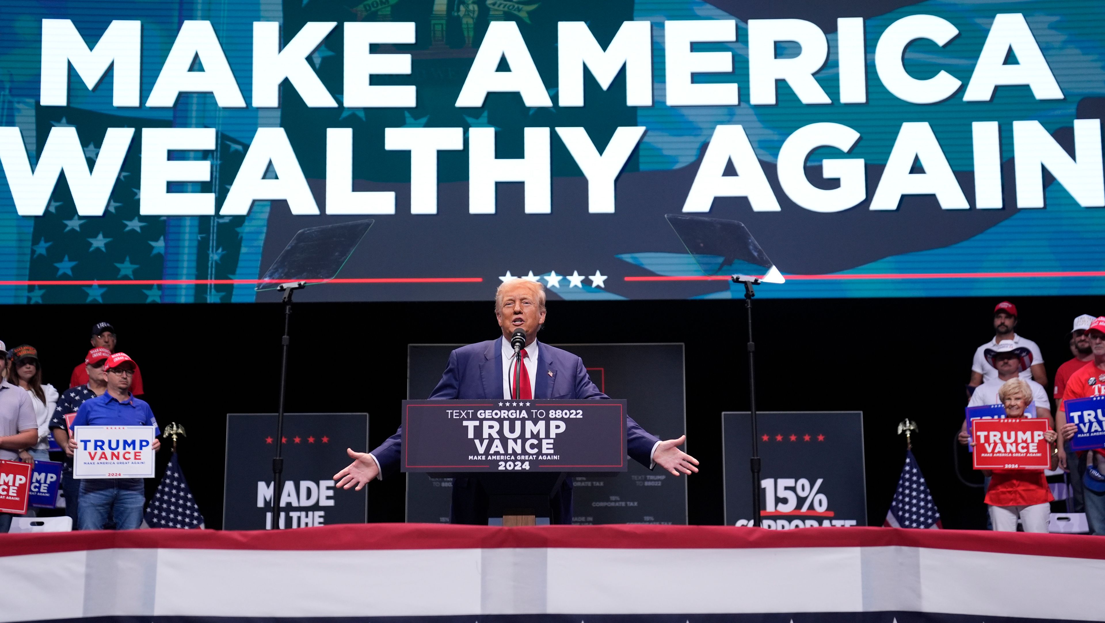 Republican presidential nominee former President Donald Trump speaks about the tax code and manufacturing at the Johnny Mercer Theatre Civic Center, Tuesday, Sept. 24, 2024, in Savannah, Ga. (AP Photo/Evan Vucci)