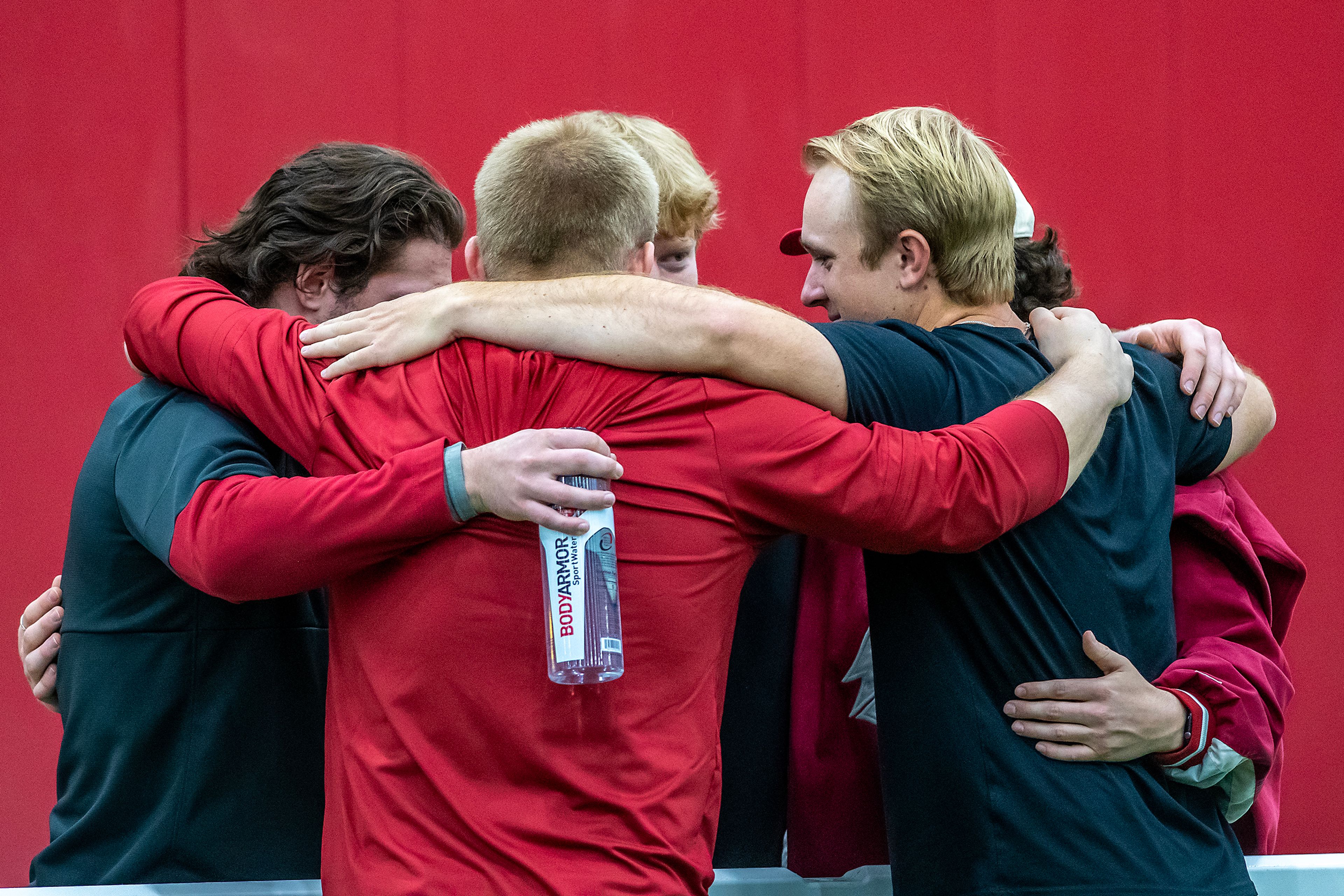 Washington State kicker Dean Janikowski embraces others on the sidelines during WSU's Pro Day on Friday in Pullman.