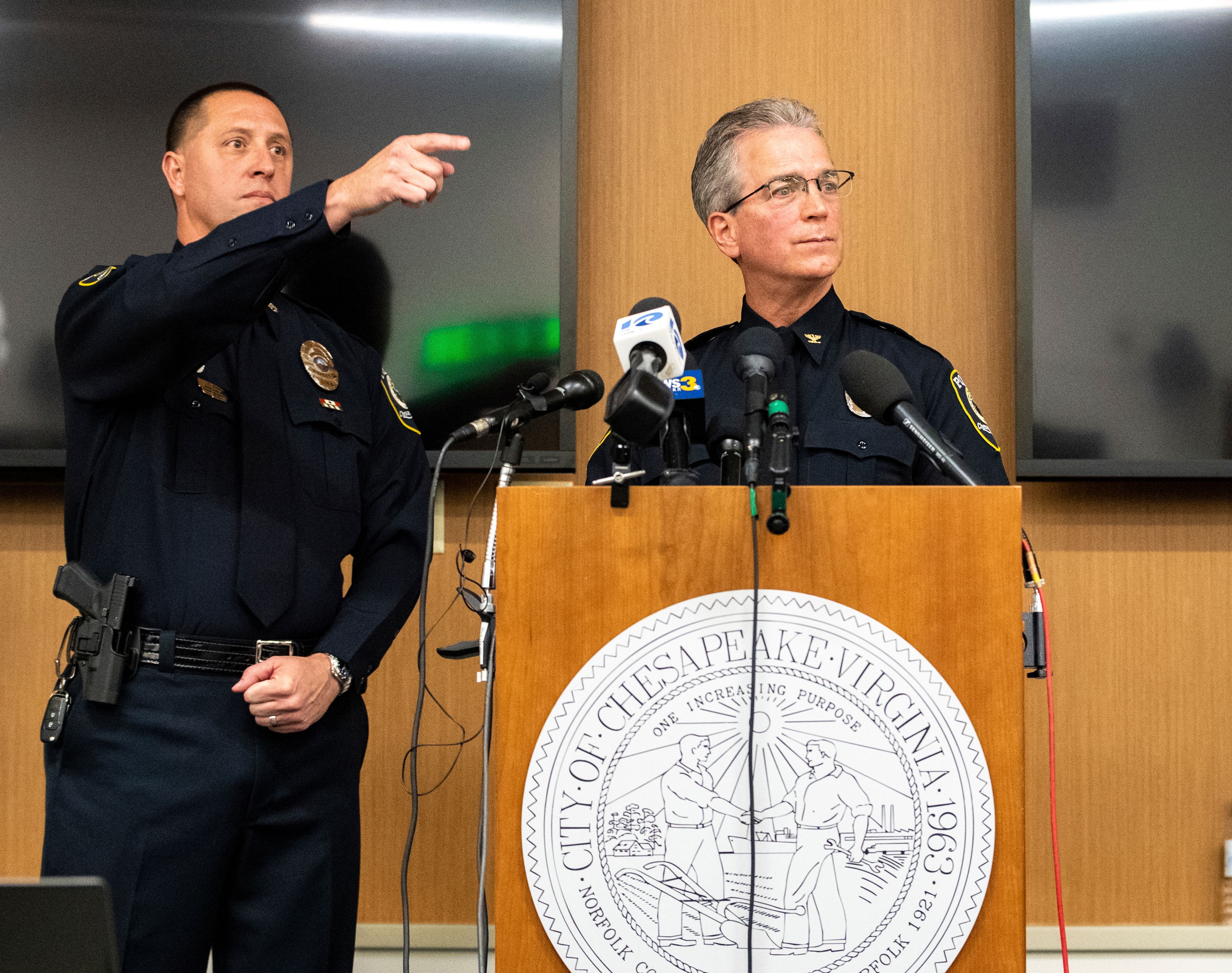 Chesapeake Police Chief Mark G. Solesky, right, and Public Information Officer Leo Kosinski, left, speak at a press conference for the Walmart shooting at the Chesapeake Public Safety Operations Center on Wednesday Nov. 23, 2022, in Chesapeake, Va. Authorities and witnesses say a Walmart manager opened fire on fellow employees in the break room of the store. (Mike Caudill/The Virginian-Pilot via AP)