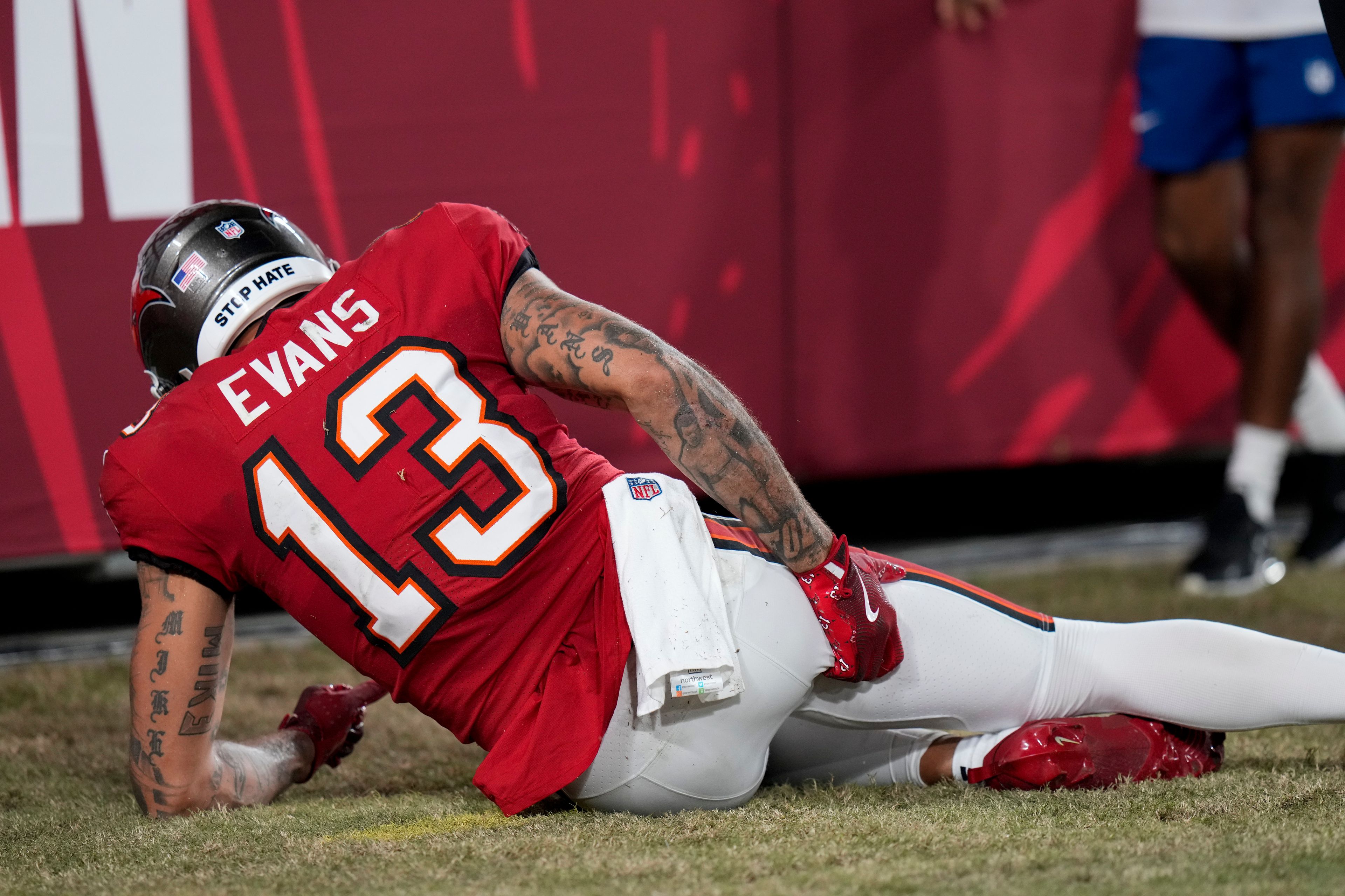 Tampa Bay Buccaneers wide receiver Mike Evans (13) reacts to an injury during the first half of an NFL football game against the Baltimore Ravens, Monday, Oct. 21, 2024, in Tampa, Fla. (AP Photo/Chris O'Meara)