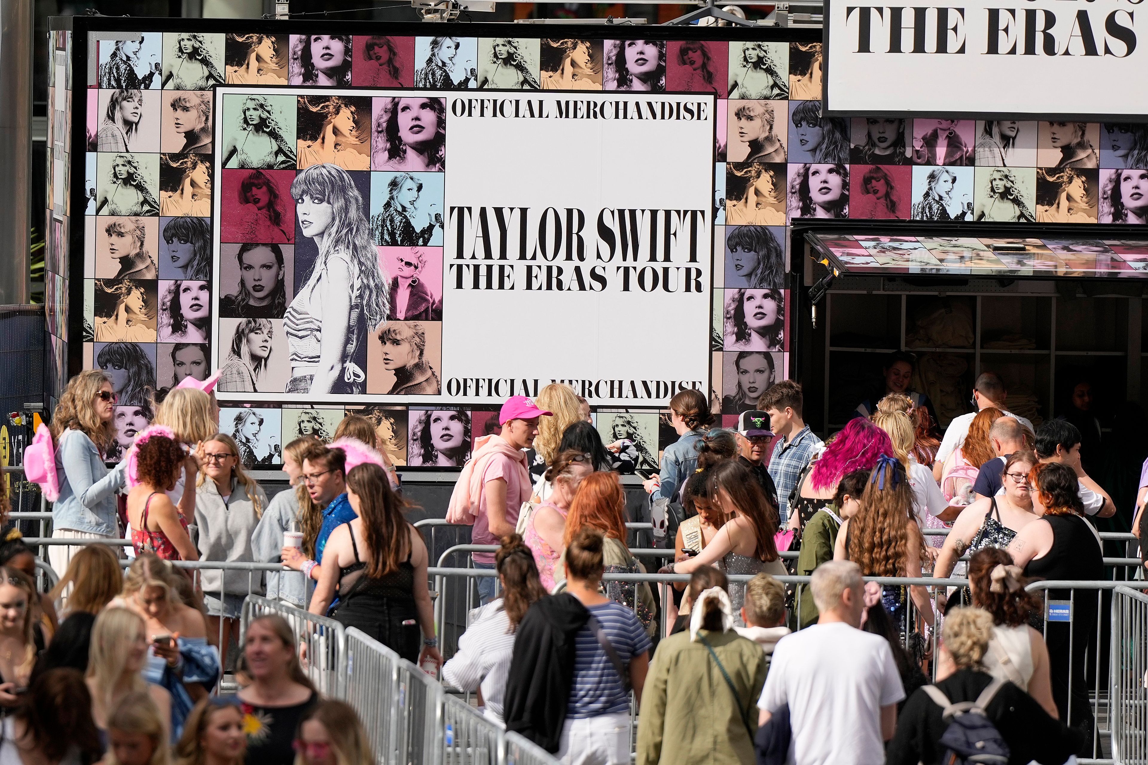 Fans of singer Taylor Swift, called Swifties, arrive at Wembley Stadium in London, Thursday, Aug. 15, 2024 for the first of five concerts of Taylor Swift's Eras Tour.