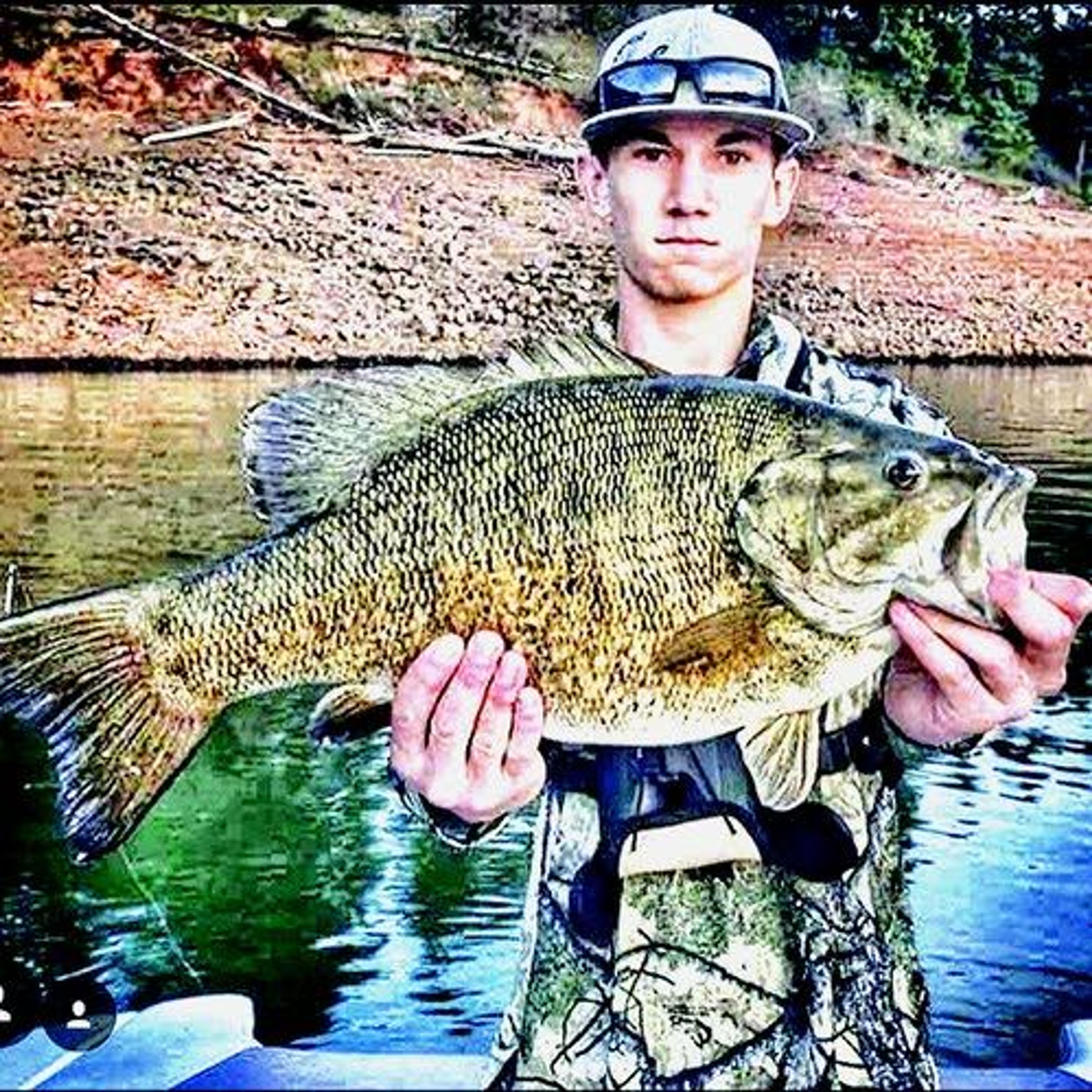 Quinten Kelly with the 9.5 pound smallmouth bass he caught on Dworshak Reservoir recently. The fish is unofficially just shy of a state record.