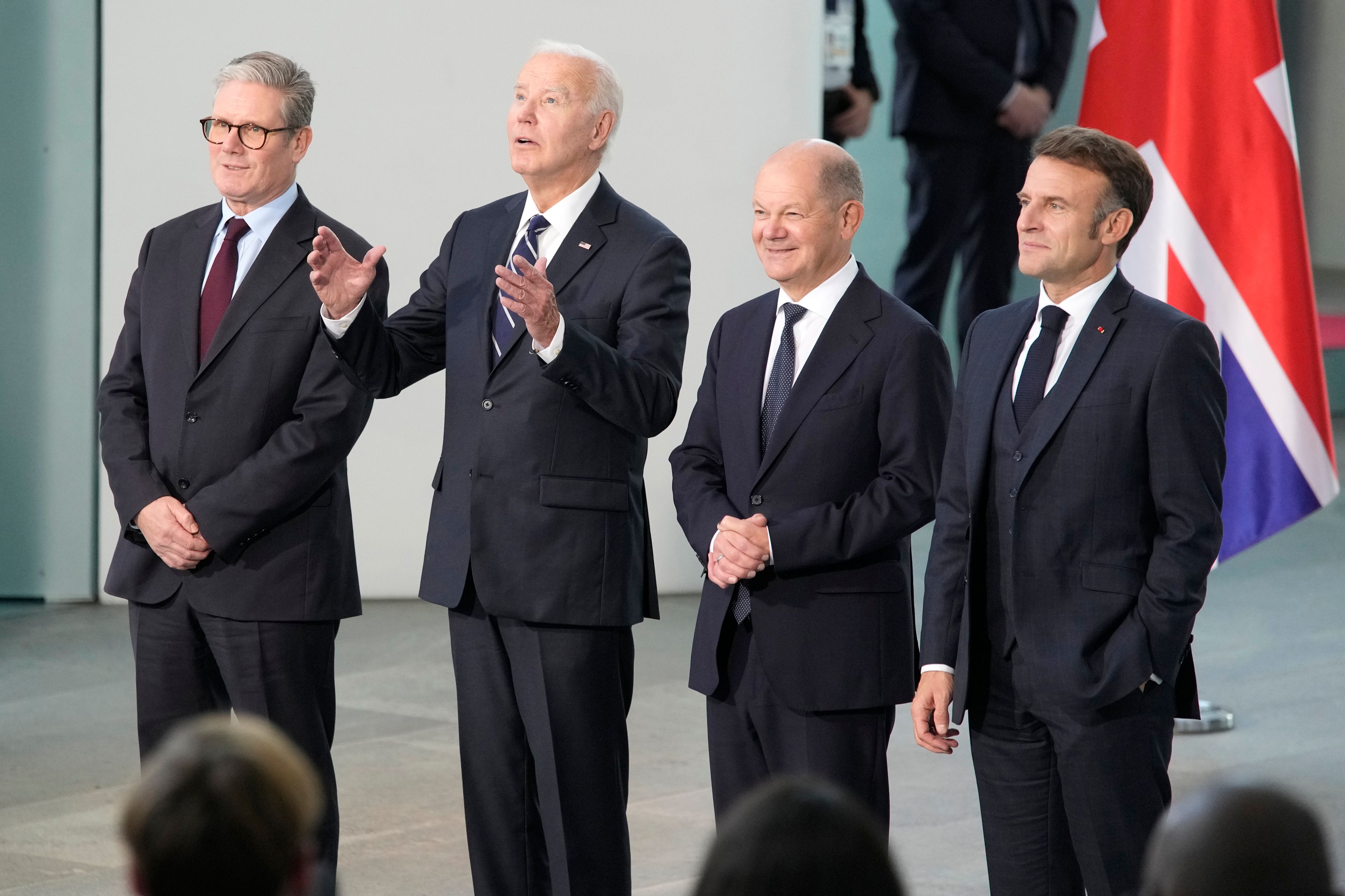 President Joe Biden, 2nd left, Chancellor Olaf Scholz of Germany, 2nd right, President Emmanuel Macron of France, right, and Prime Minister Keir Starmer of the United Kingdom, pose for a family photo as they meet at the Chancellery in Berlin, Germany, Friday, Oct. 18, 2024. (AP Photo/Ben Curtis)