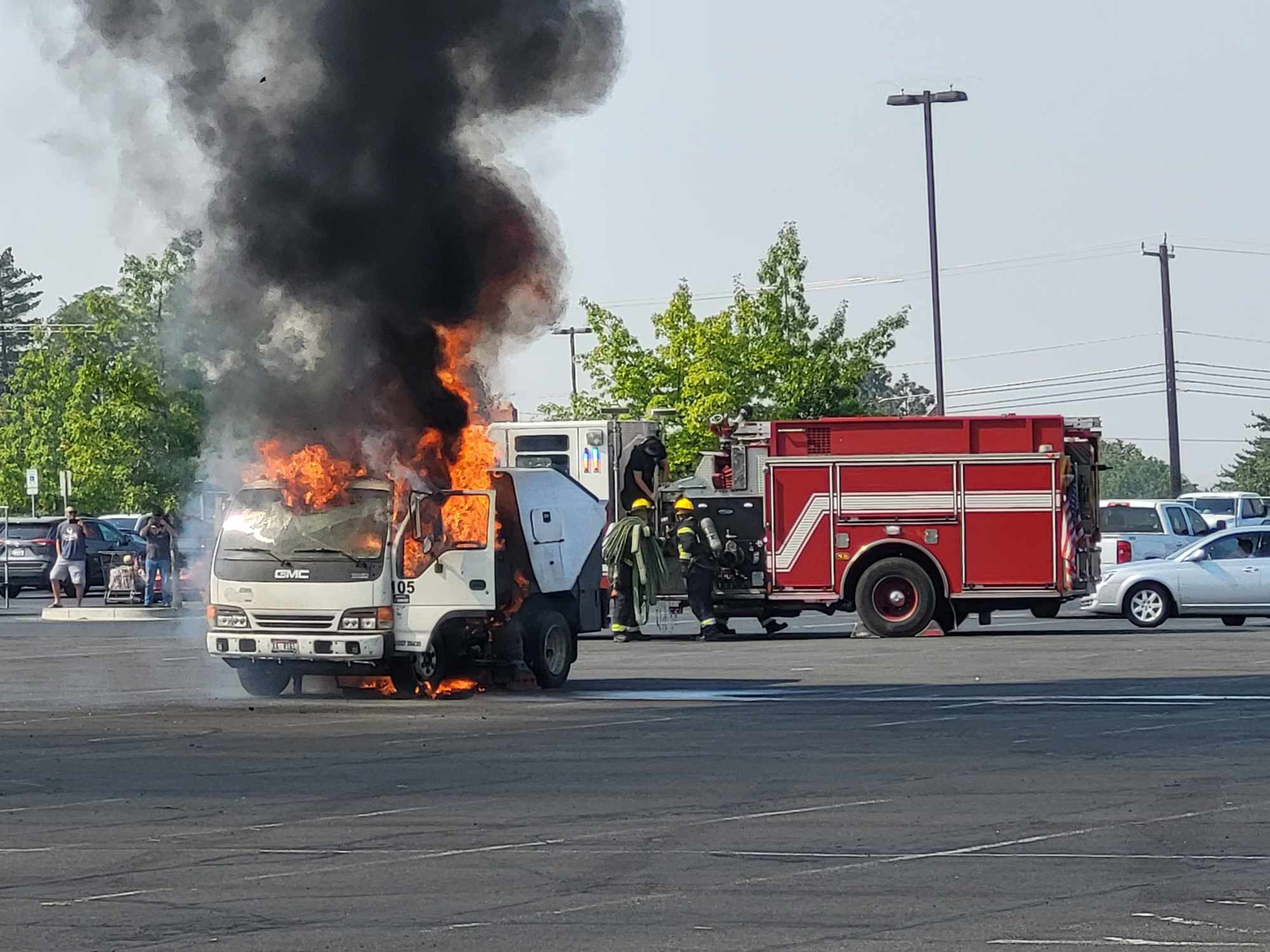 A street sweeper is on fire in the parking lot of the Lewiston Central Mall on Saturday morning.