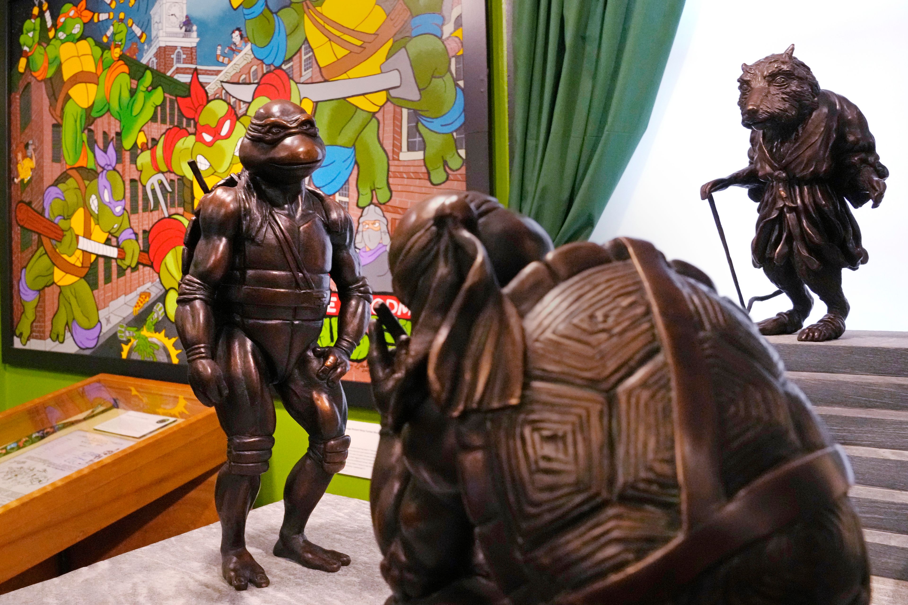 ronze statues of the Teenage Mutant Ninja Turtles characters are displayed as part of the permanent collection at the Woodman Museum, Thursday, Sept. 5, 2024, in Dover, N.H.