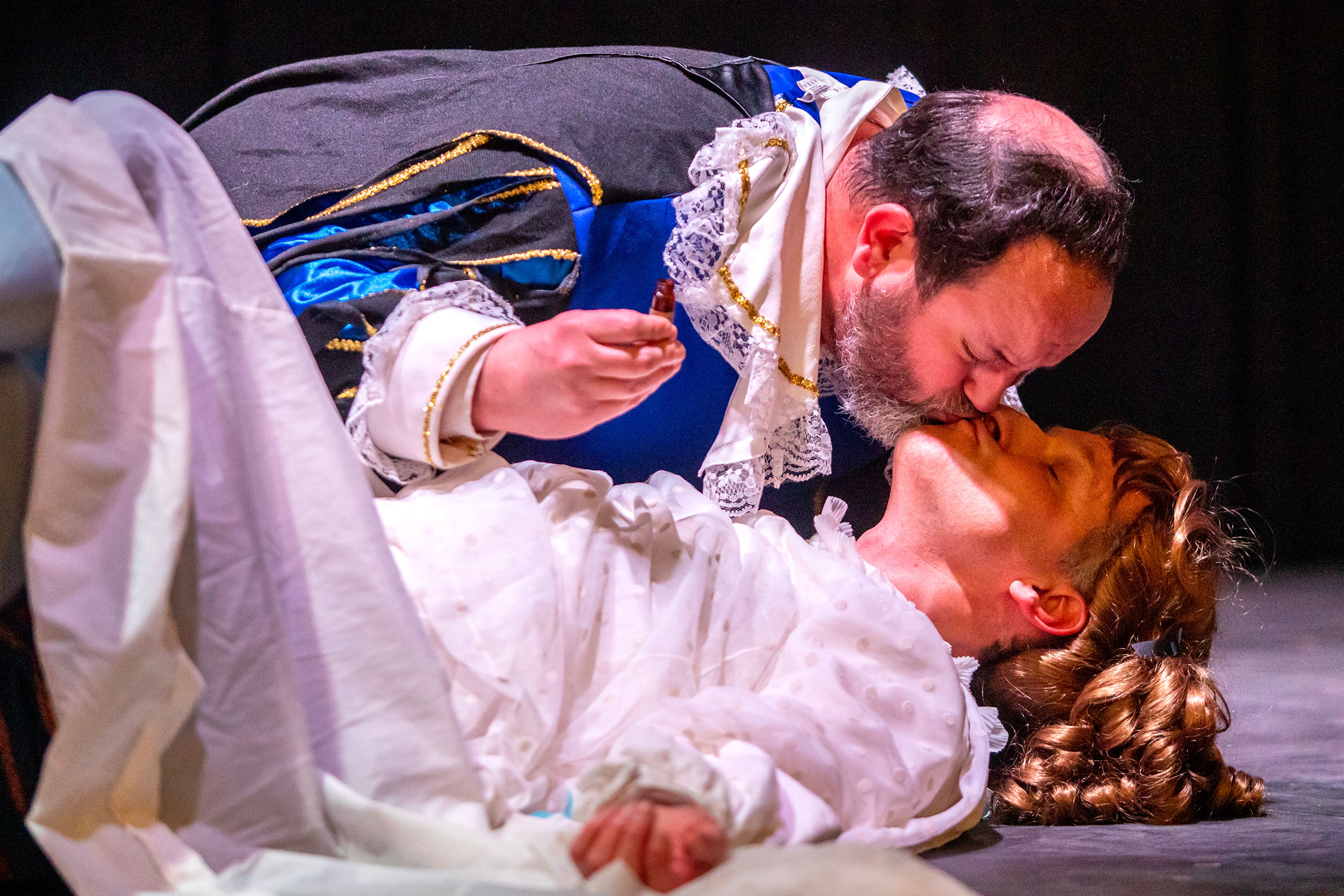 Jacob Trickey, playing Romeo, kisses Travis Osburn, playing Juliet during a rehearsal for “The Complete Works of William Shakespeare (Abridged)” Thursday last week at Lindsay Creek Vineyards in Lewiston.