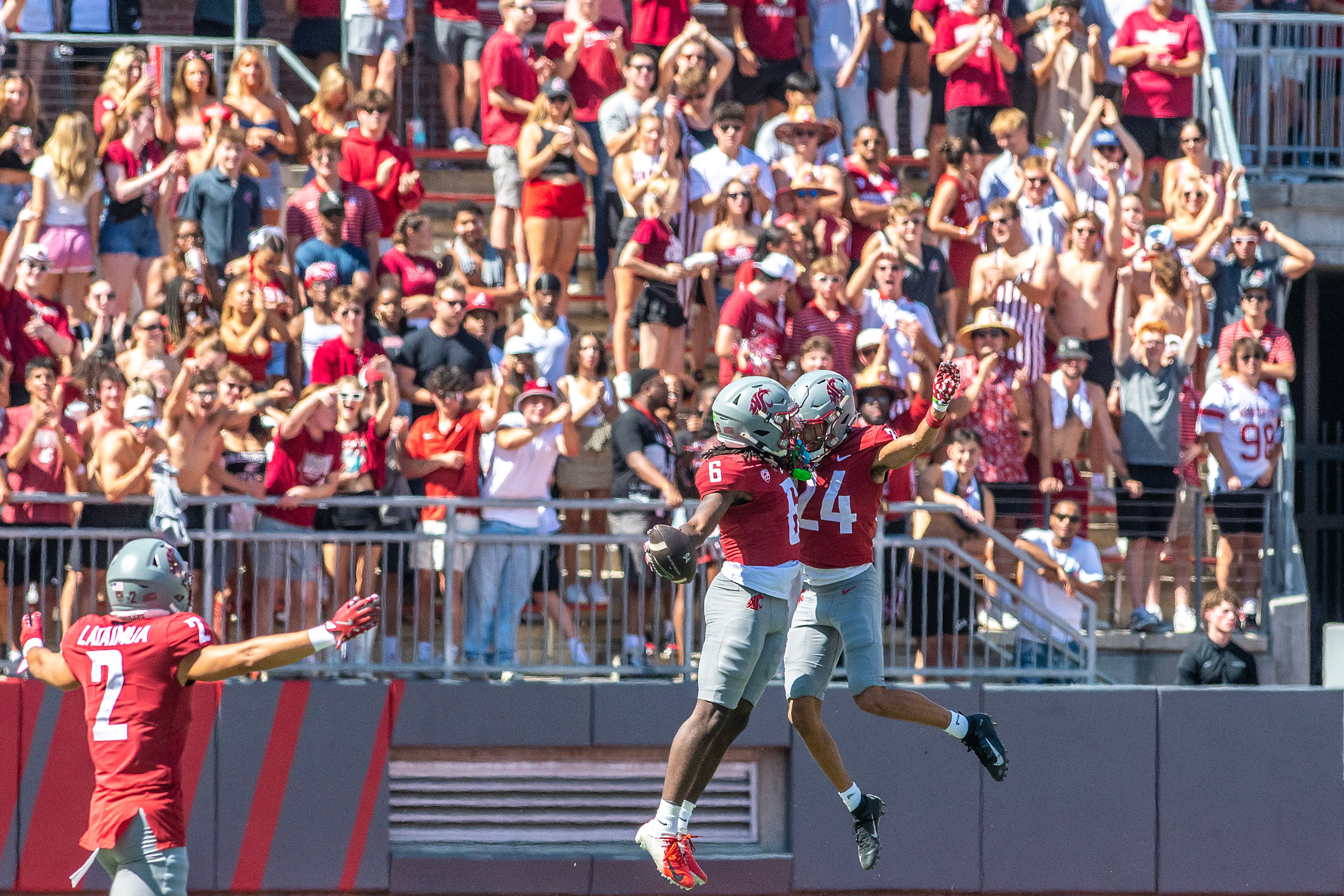 Washington State defensive back Adrian Wilson (6) and Washington State defensive back Ethan O'Connor celebrate an interception that was called back during a quarter of a nonconference game at Gesa Field in Pullman.