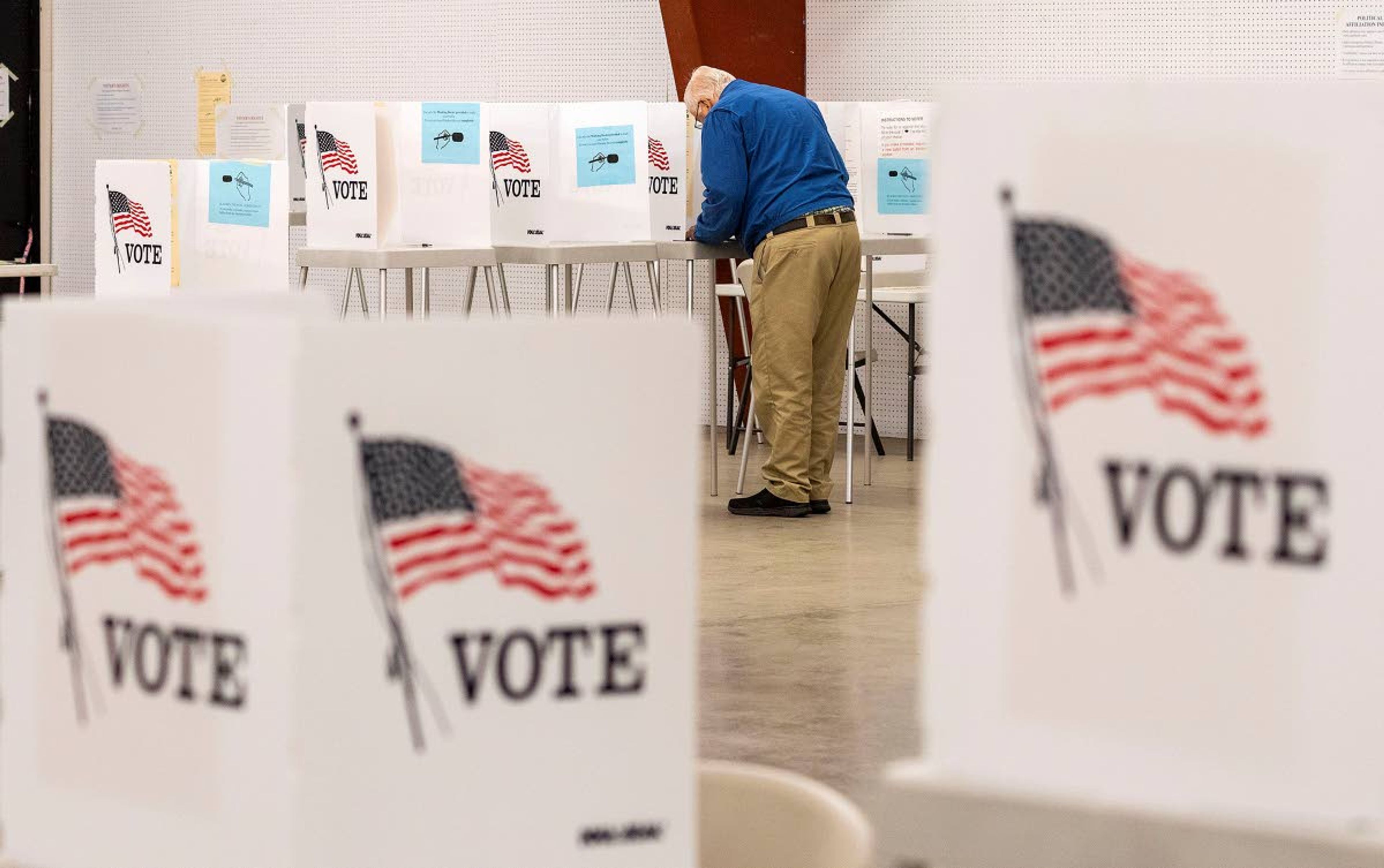 A voter marks his ballot Tuesday in the Moscow police station bond election at the Latah County Fairgrounds in Moscow.