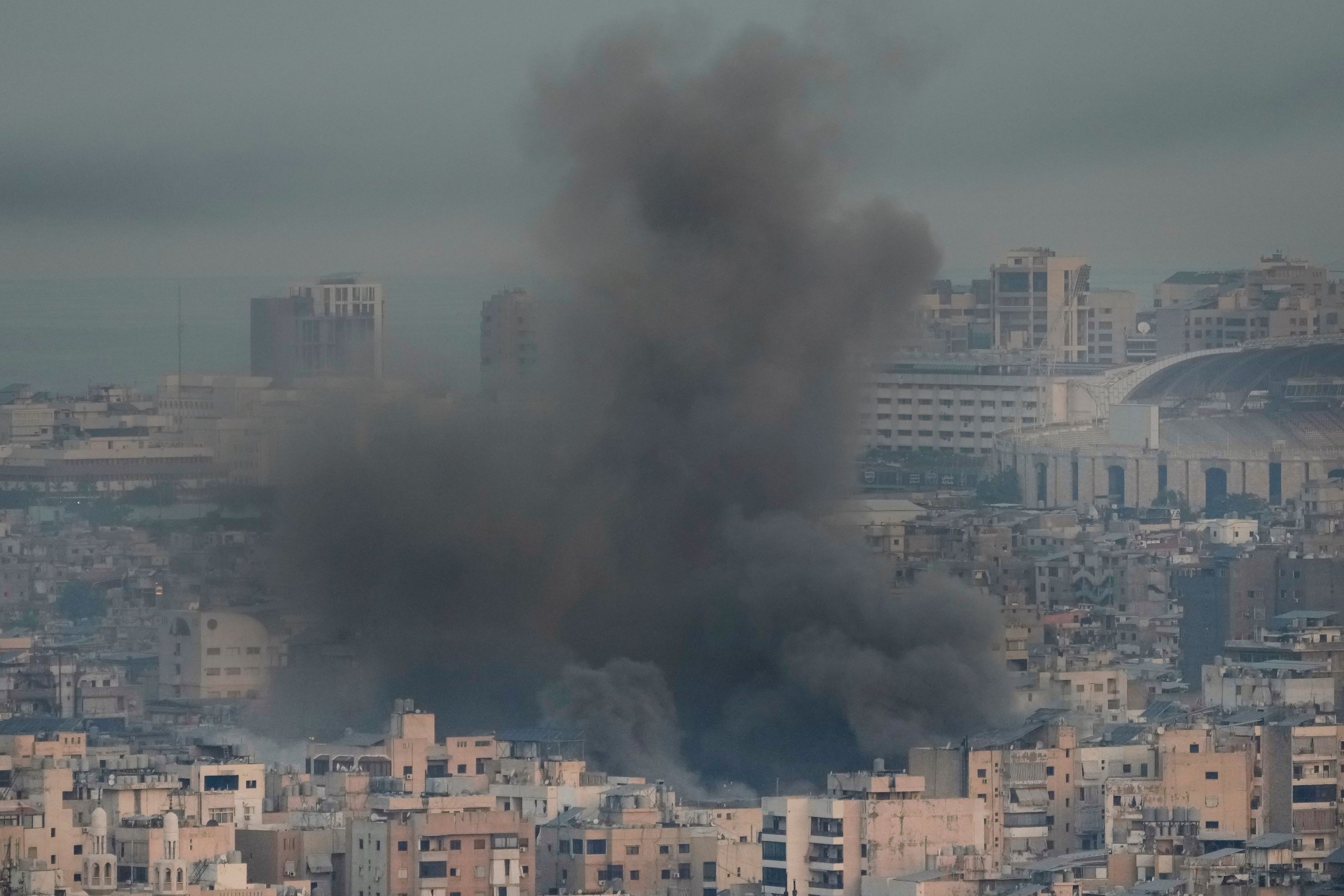 Smoke rises from Israeli airstrikes on Dahiyeh, Beirut's southern suburbs, Lebanon, Wednesday, Oct. 16, 2024. (AP Photo/Hussein Malla)