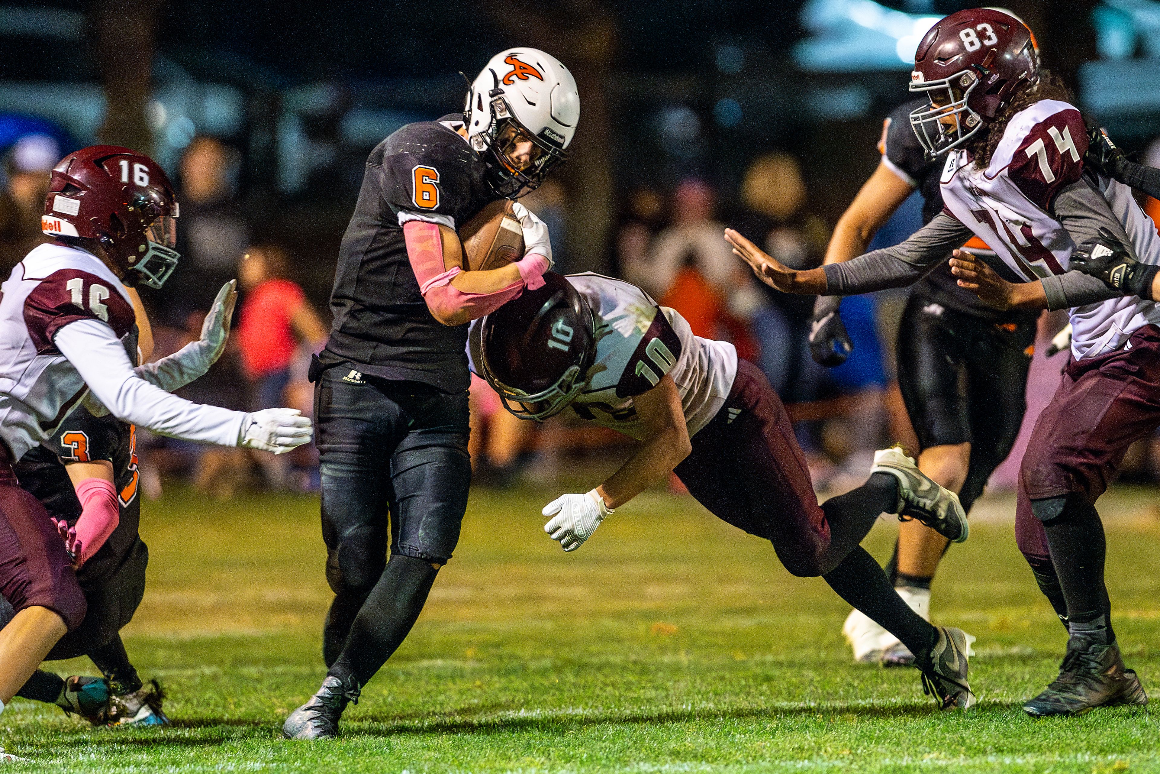 Asotin running back Peter Eggleston runs the ball as a Reardan player attempts to tackle him during a Northeast 2B League game Friday in Asotin.,